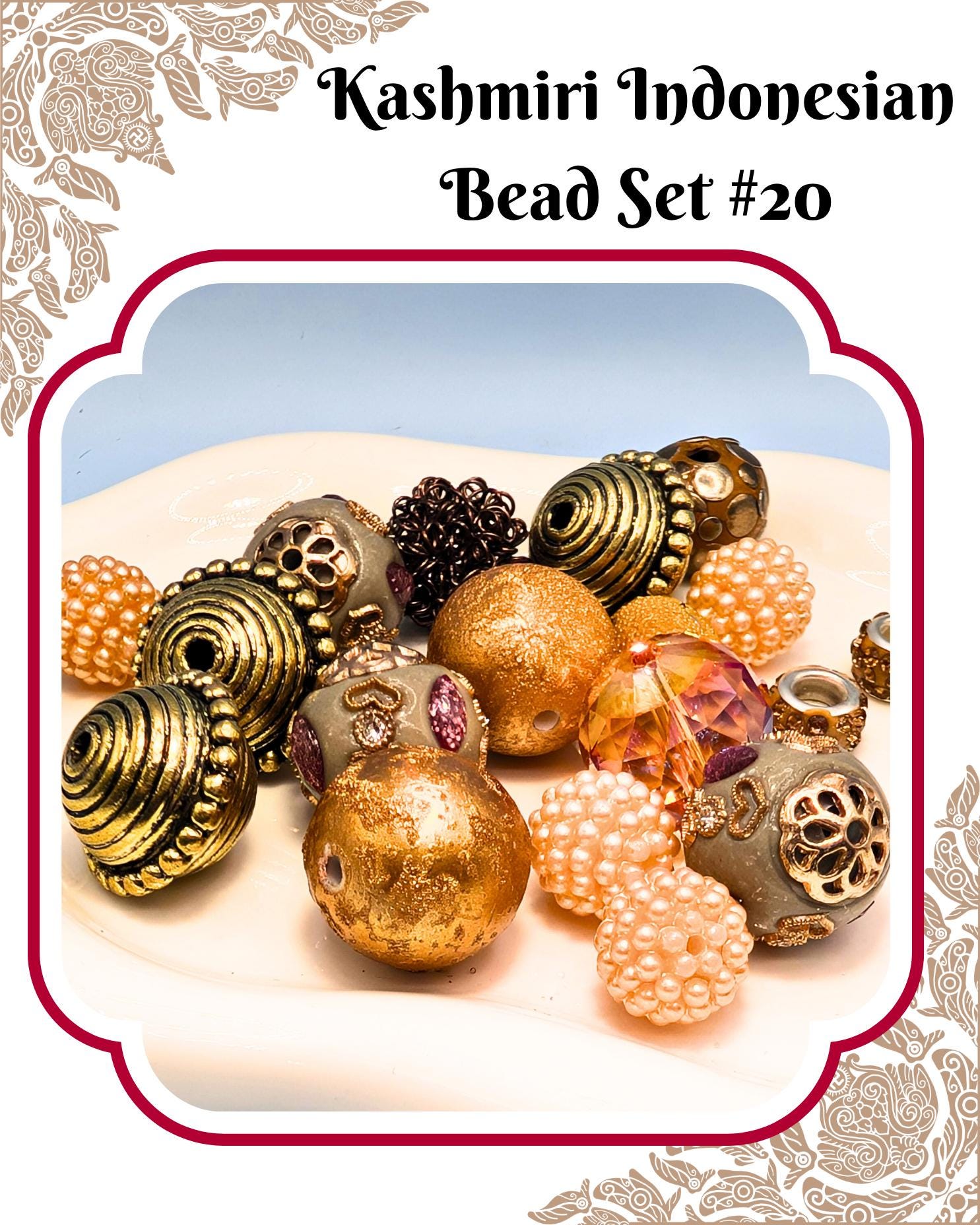 a collection of colorful beads, including gold, silver, and pearl-like beads, arranged on a white surface.