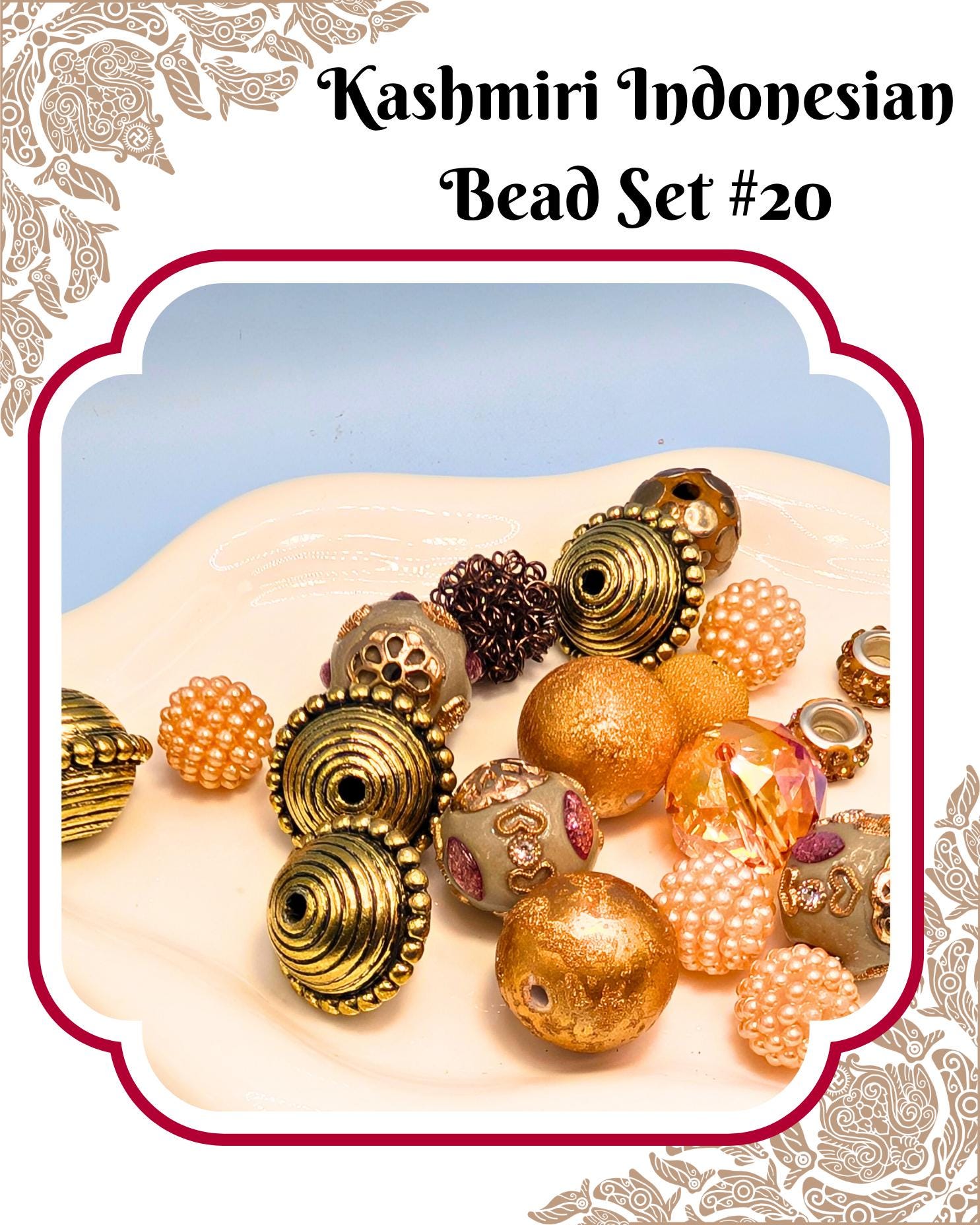 a collection of colorful beads, including gold, orange, and white beads, arranged on a white surface.