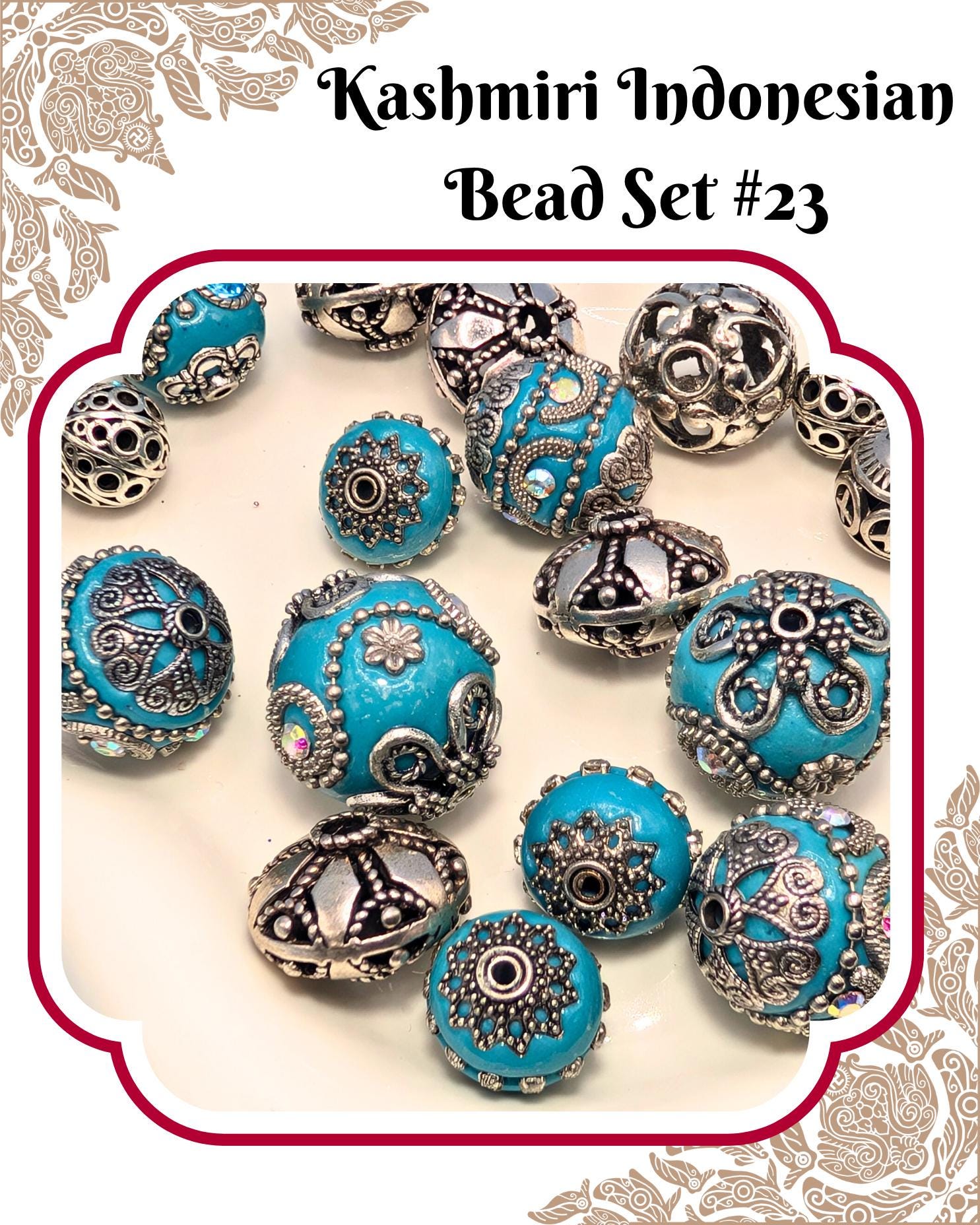 a collection of colorful beads, including turquoise and silver beads, arranged on a white surface.