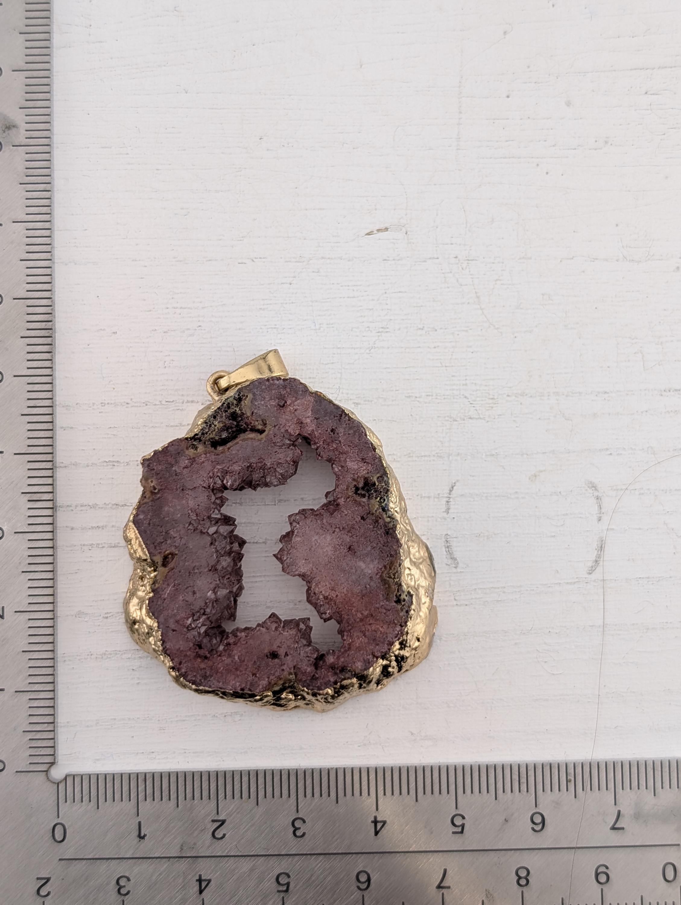 Dyed Agate Geode Pendant in a gold tone setting