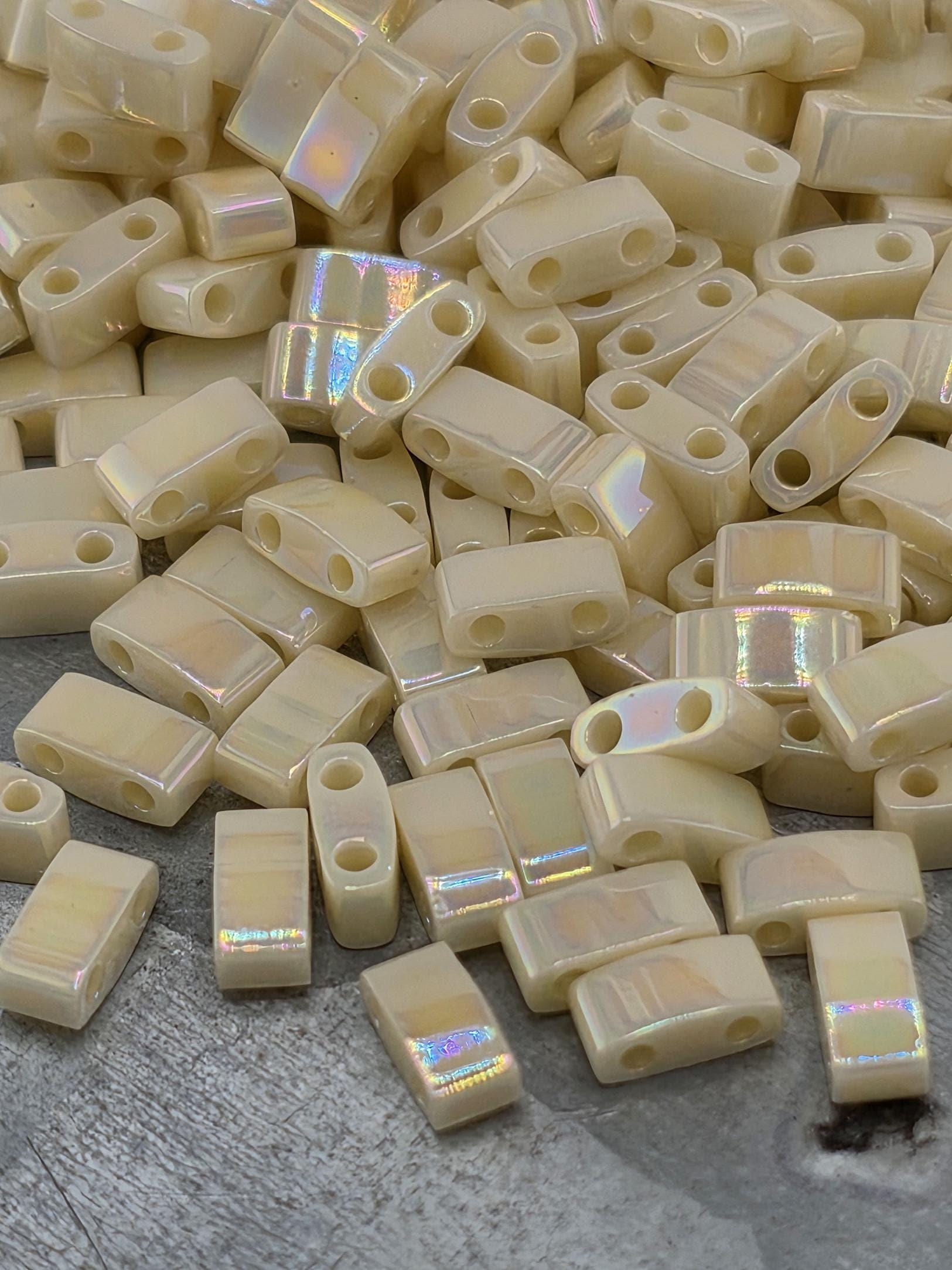 HTL0486-Miyuki Half-TIla Beads:Eggshell O/R (7.5g pkg)