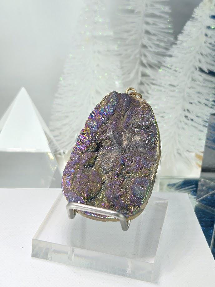a clear glass stand displaying a large, colorful, and unique rock formation.