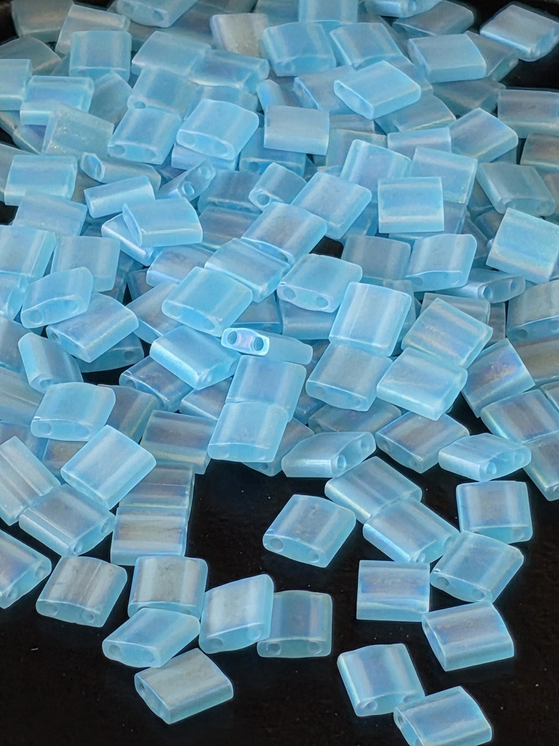 TL0148FR-Miyuki Tila Beads:Blue Topaz T/MA/R (7.5g pkg)