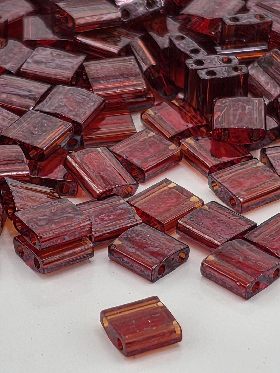 TL0304-Miyuki Tila Beads:Garnet Gold T/L (7.5g pkg)