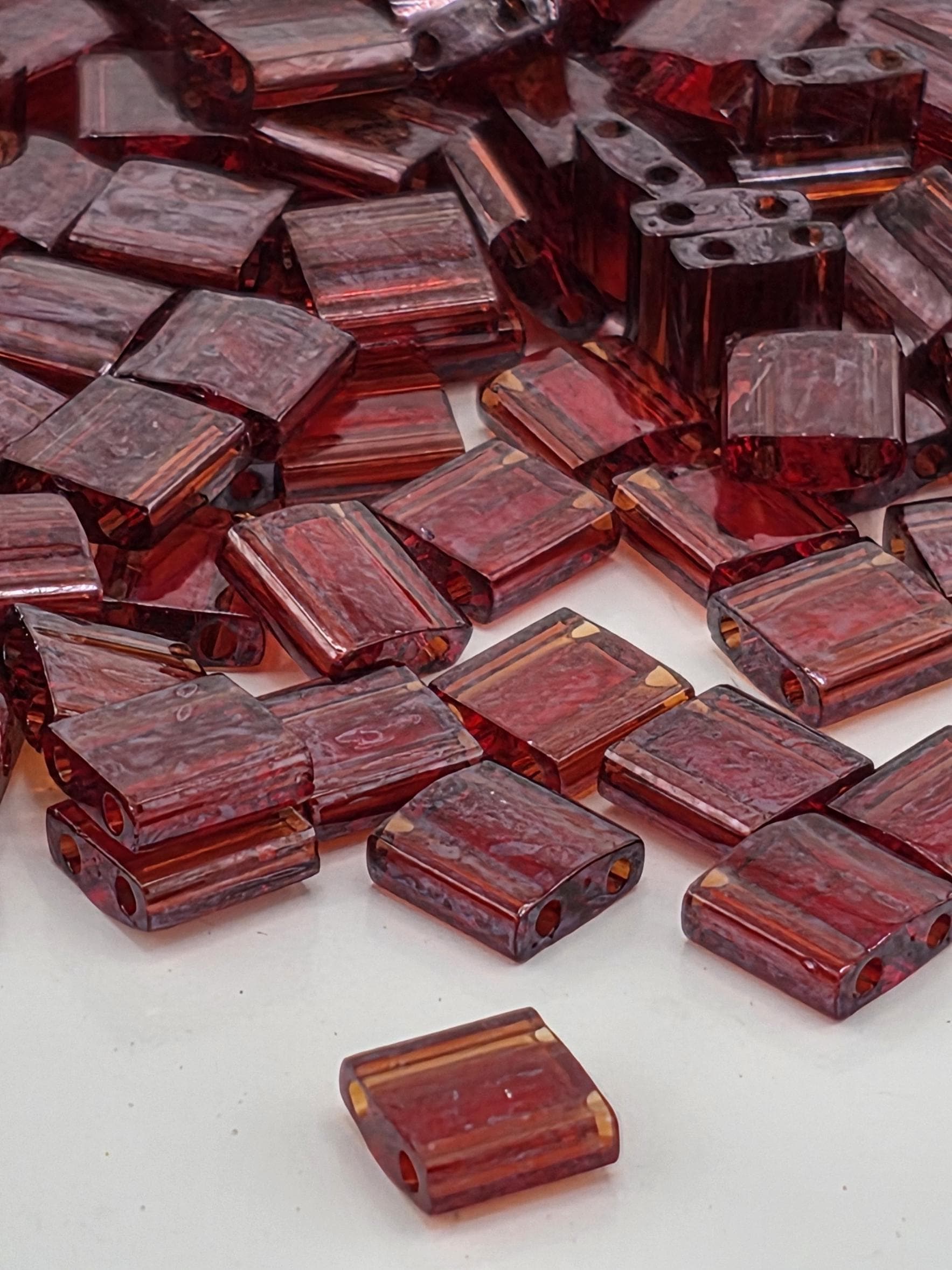 TL0304-Miyuki Tila Beads:Garnet Gold T/L (7.5g pkg)