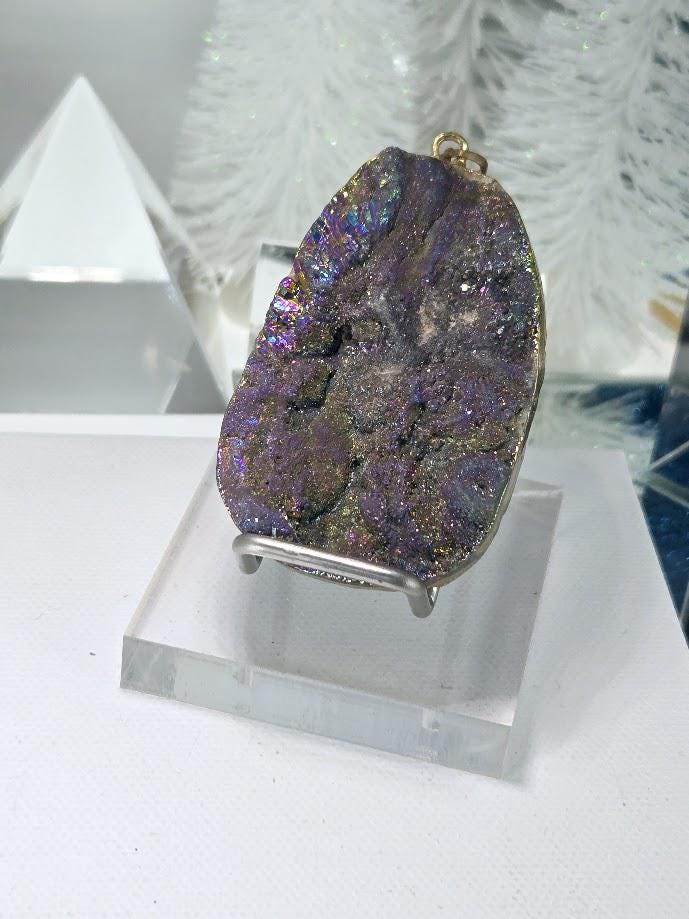 a clear glass stand displaying a large, colorful, and unique rock formation.