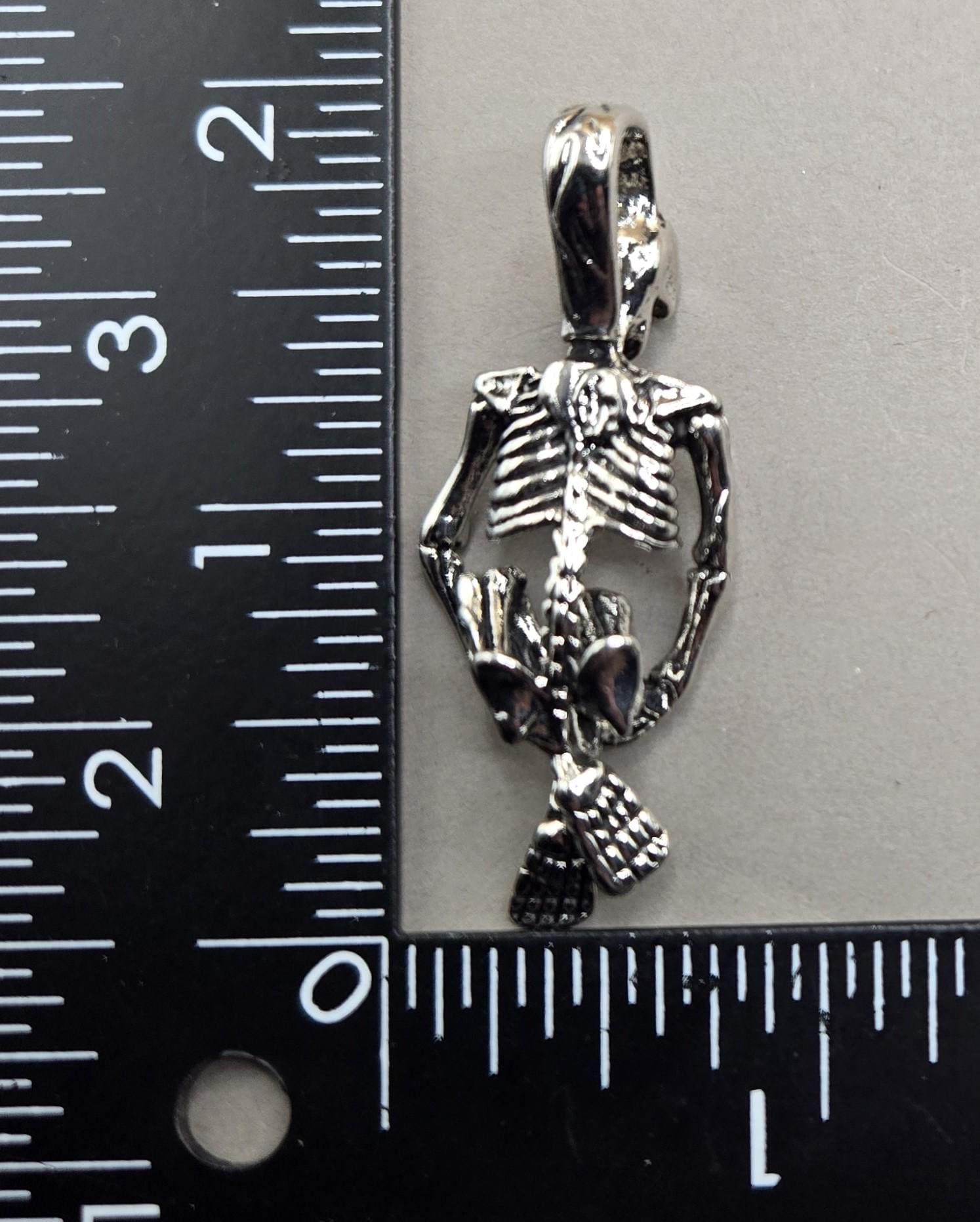 Gothic Skull Pendant: Silver Plated with Angel Wing Detail