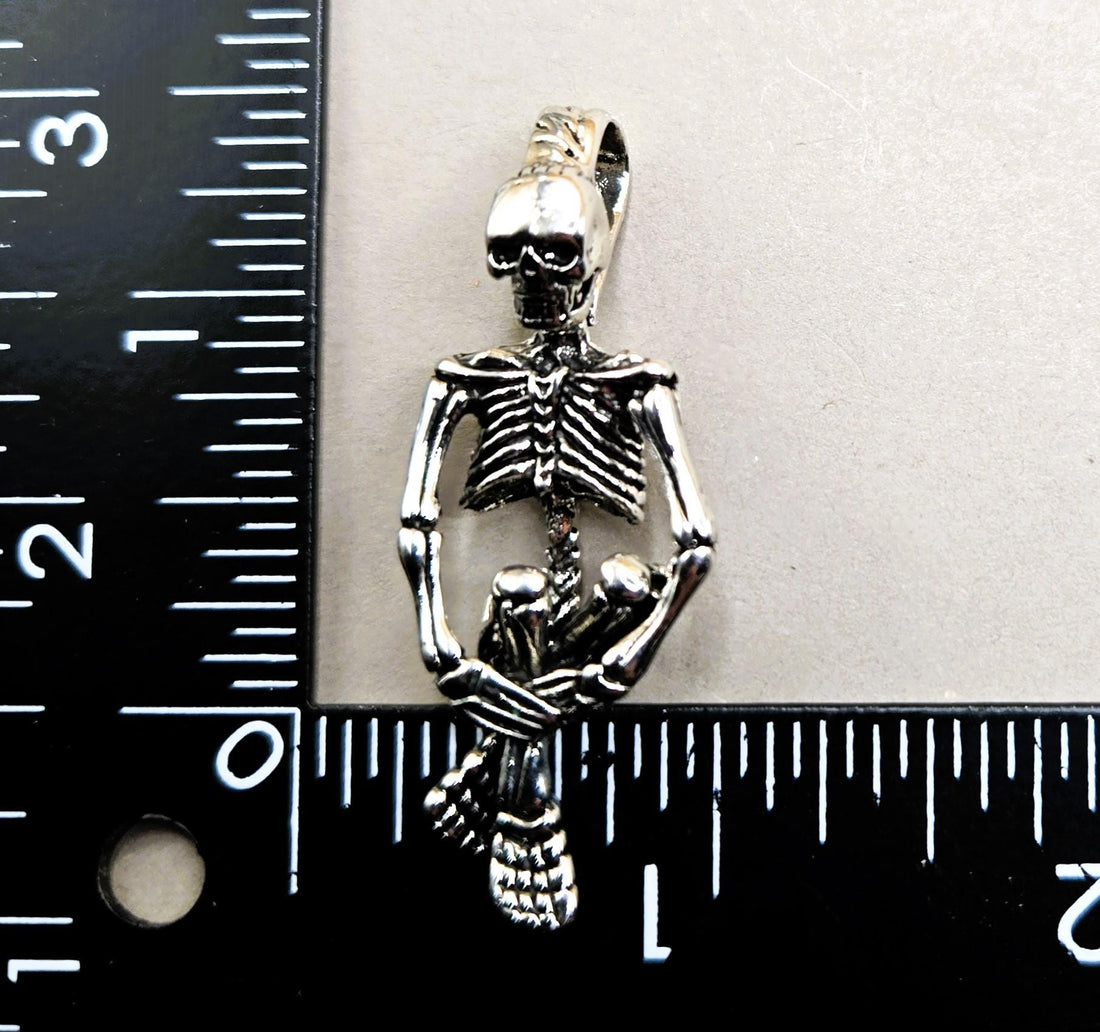 Gothic Skull Pendant: Silver Plated with Angel Wing Detail