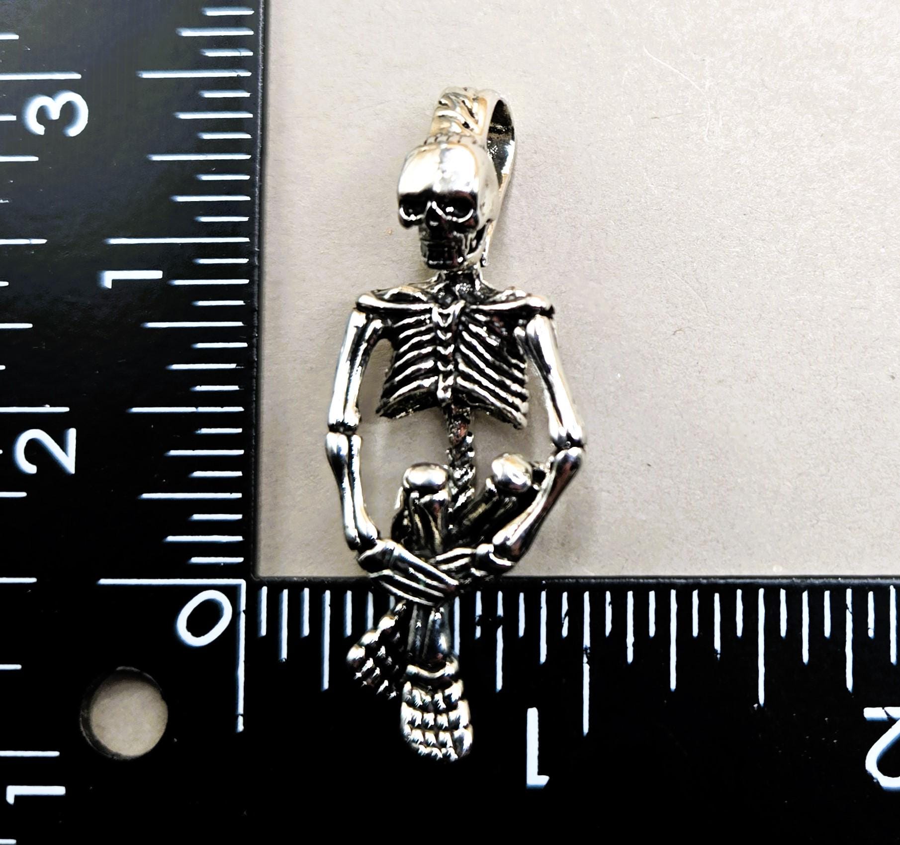 Gothic Skull Pendant: Silver Plated with Angel Wing Detail