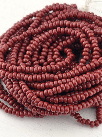 Preciosa 11/0 Czech Op Medium Brown -6 String/Hnk-Appx 18 Gms