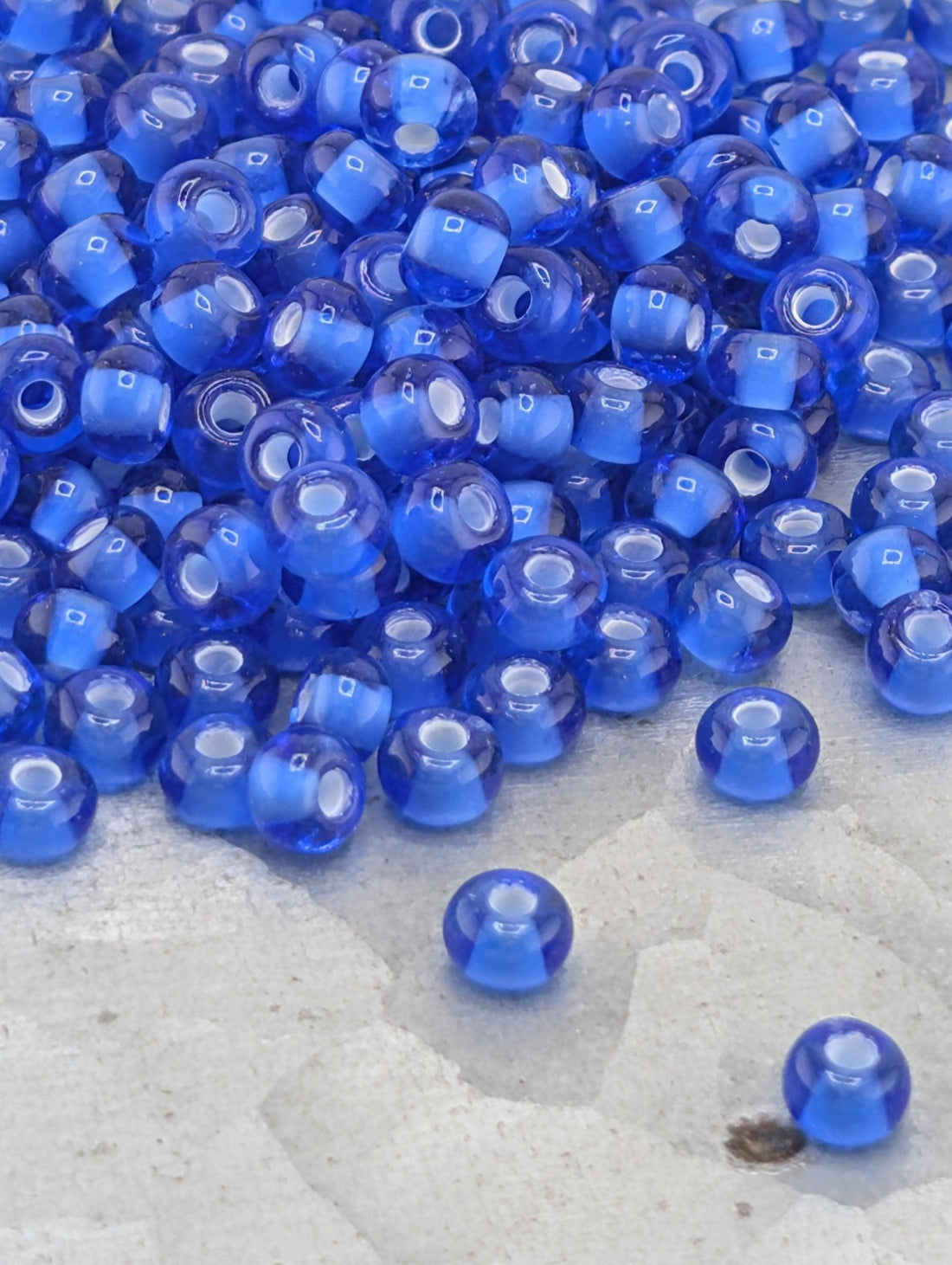 Seed Beads: Preciosa Transparent Chalkwhite-Lined Sapphire - Size 6, 15g