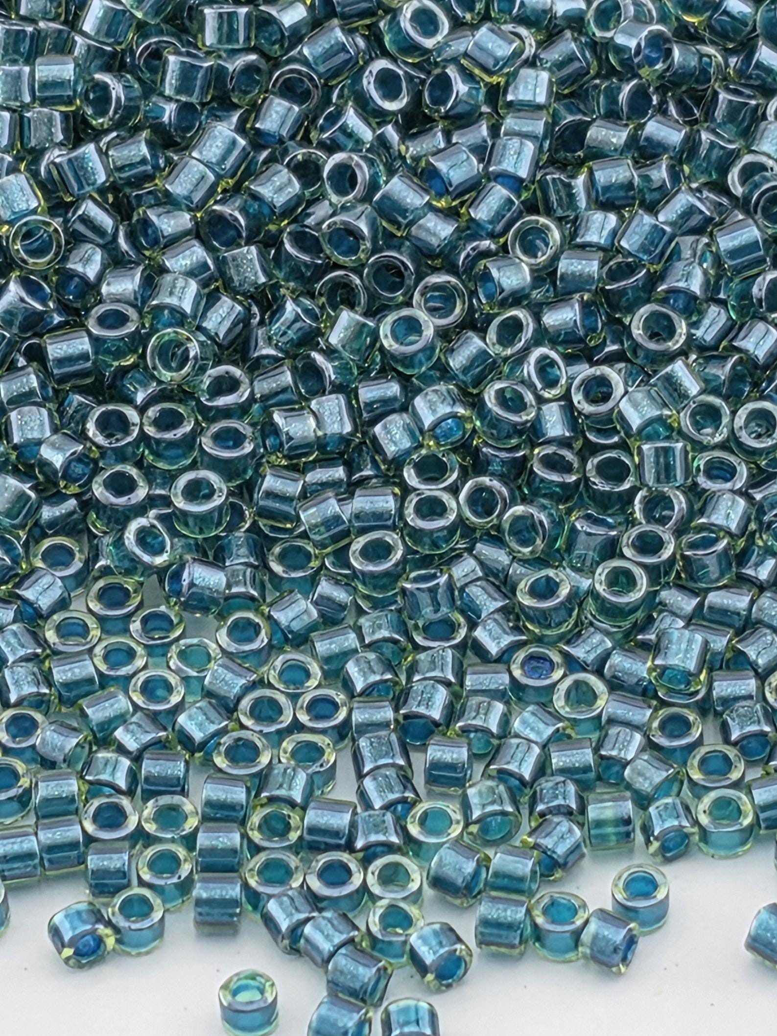 DB0919:Lt Green/Dark Teal Inside Color Lined Sparkle Duracoat Miyuki Delica (Size 11, 7 grams, ~1400 beads)