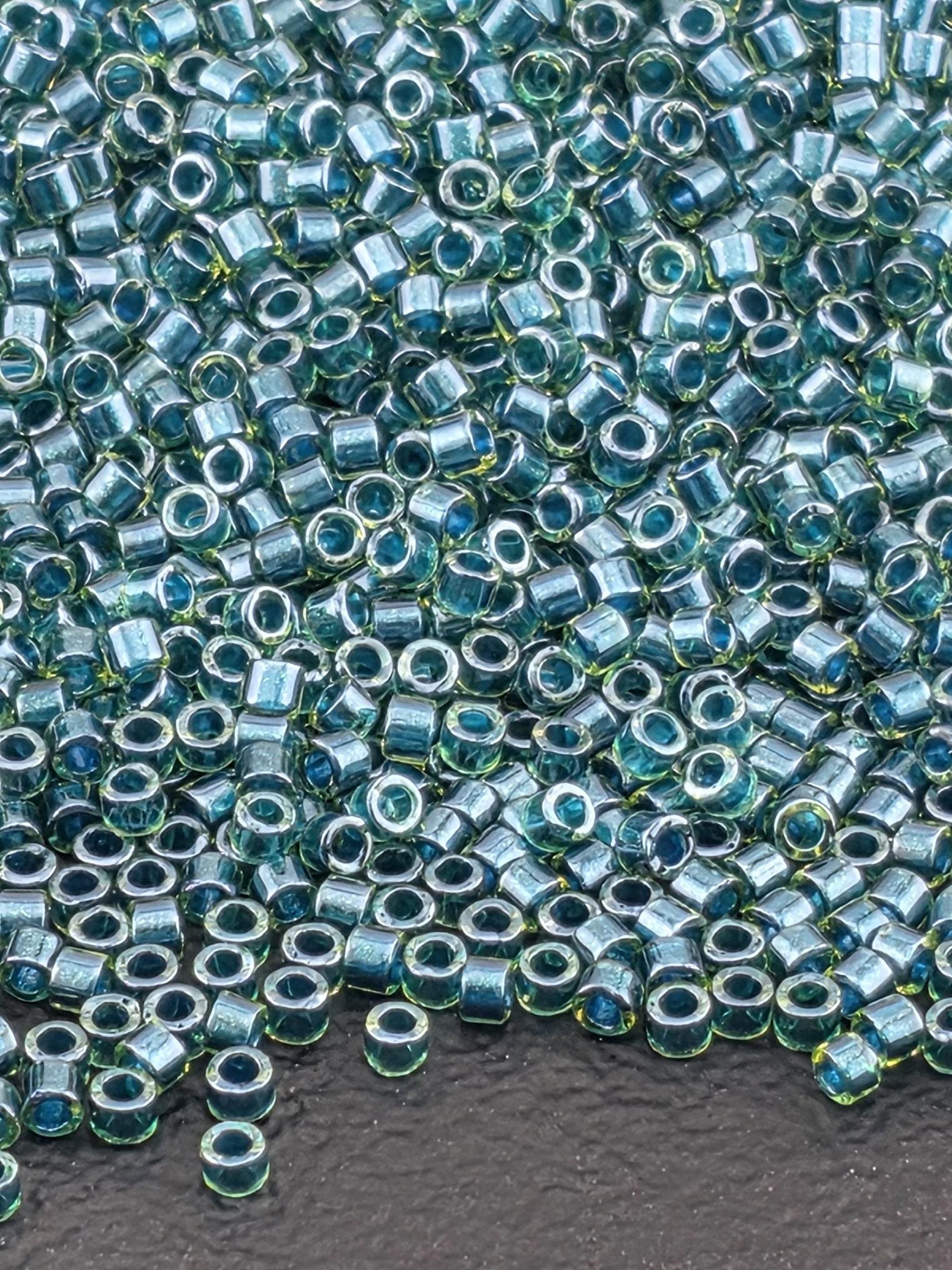 DB0919:Lt Green/Dark Teal Inside Color Lined Sparkle Duracoat Miyuki Delica (Size 11, 7 grams, ~1400 beads)