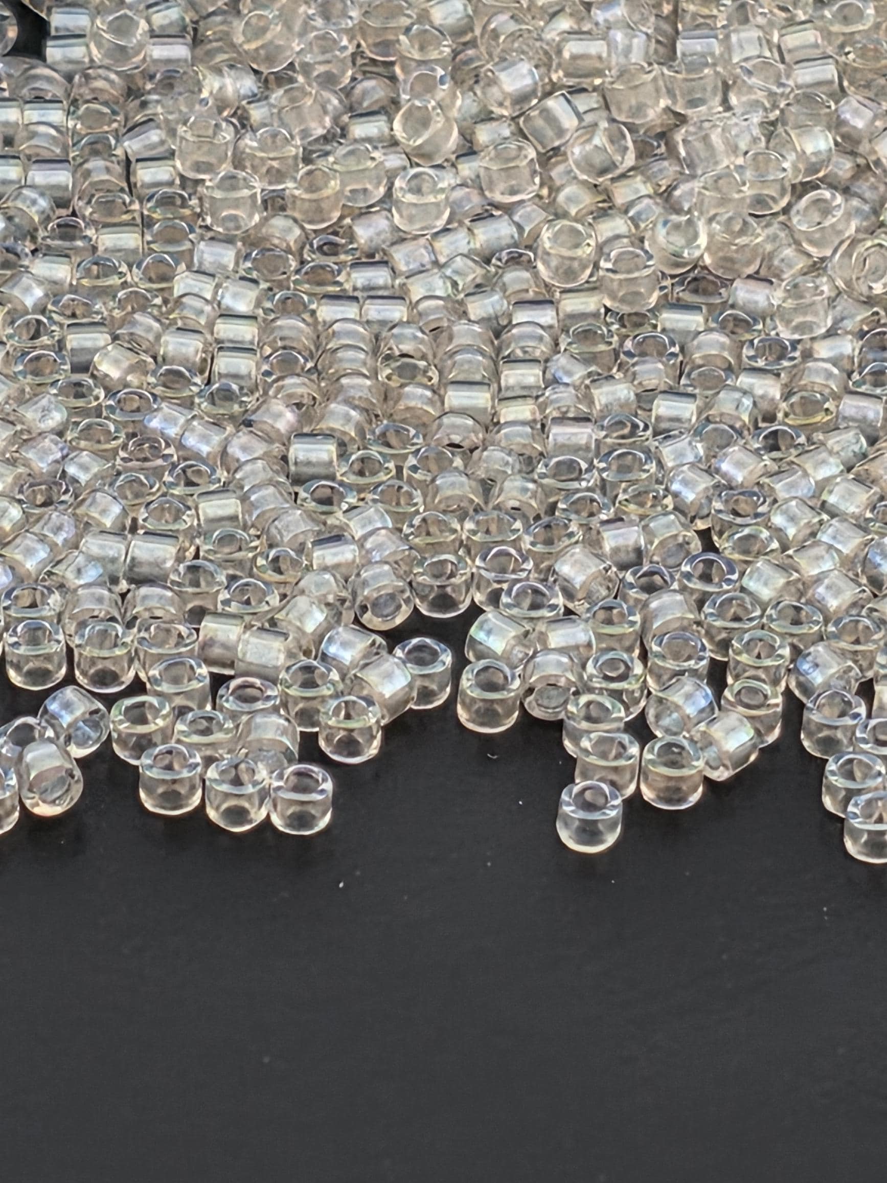 DB1673:Crystal/Cotton Candy Translucent Inside Color Lined Pearl Miyuki Delica (Size 11, 7 grams, ~1400 beads)