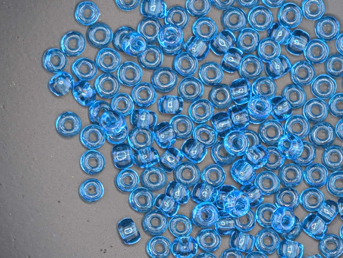 Matsuno Seed Beads Size 6: Transparent Light Turquoise Blue, 15g Pack