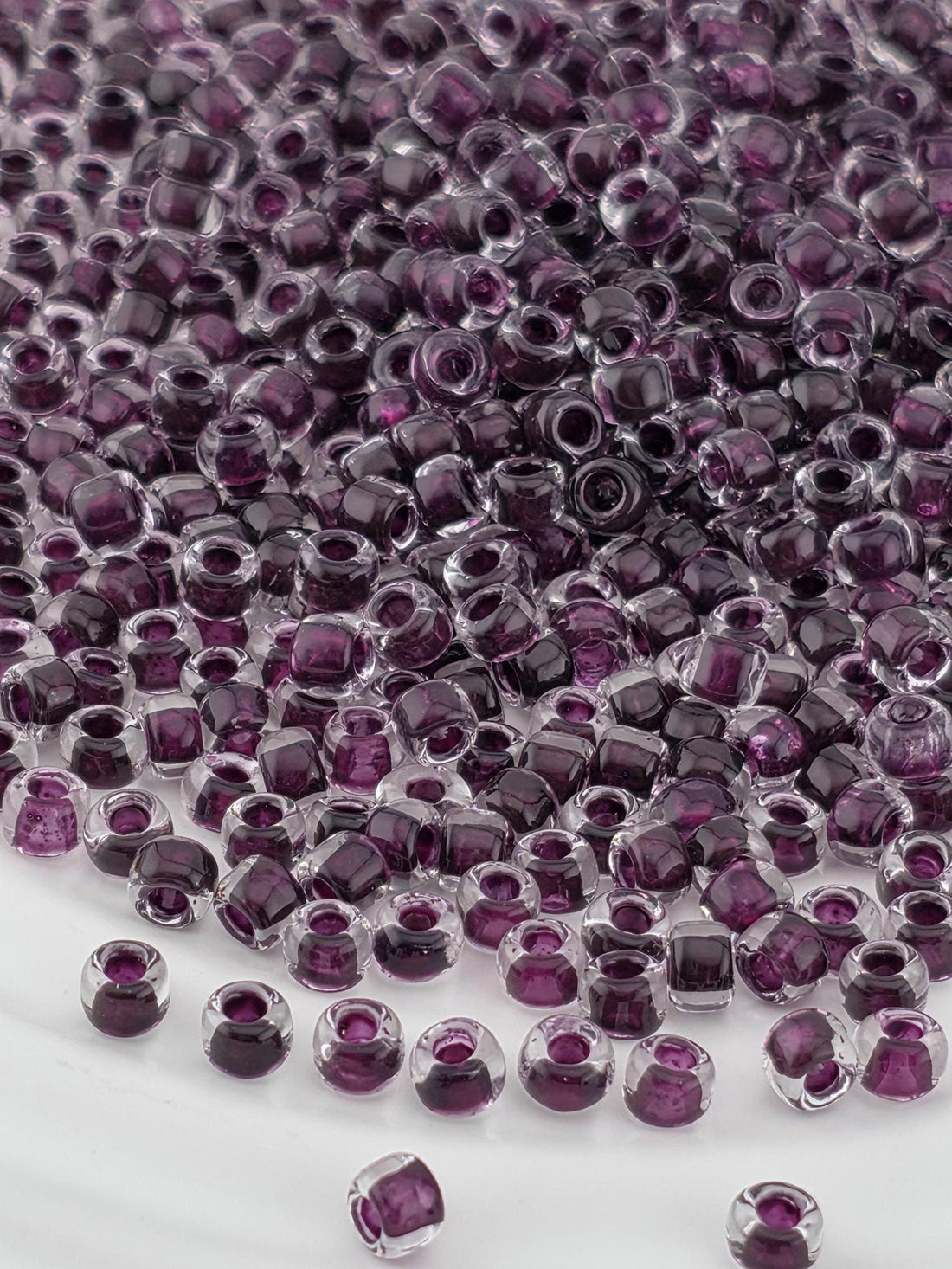 Matsuno Seed Beads: Translucent Dark Mauve - Size 6, 15g Package