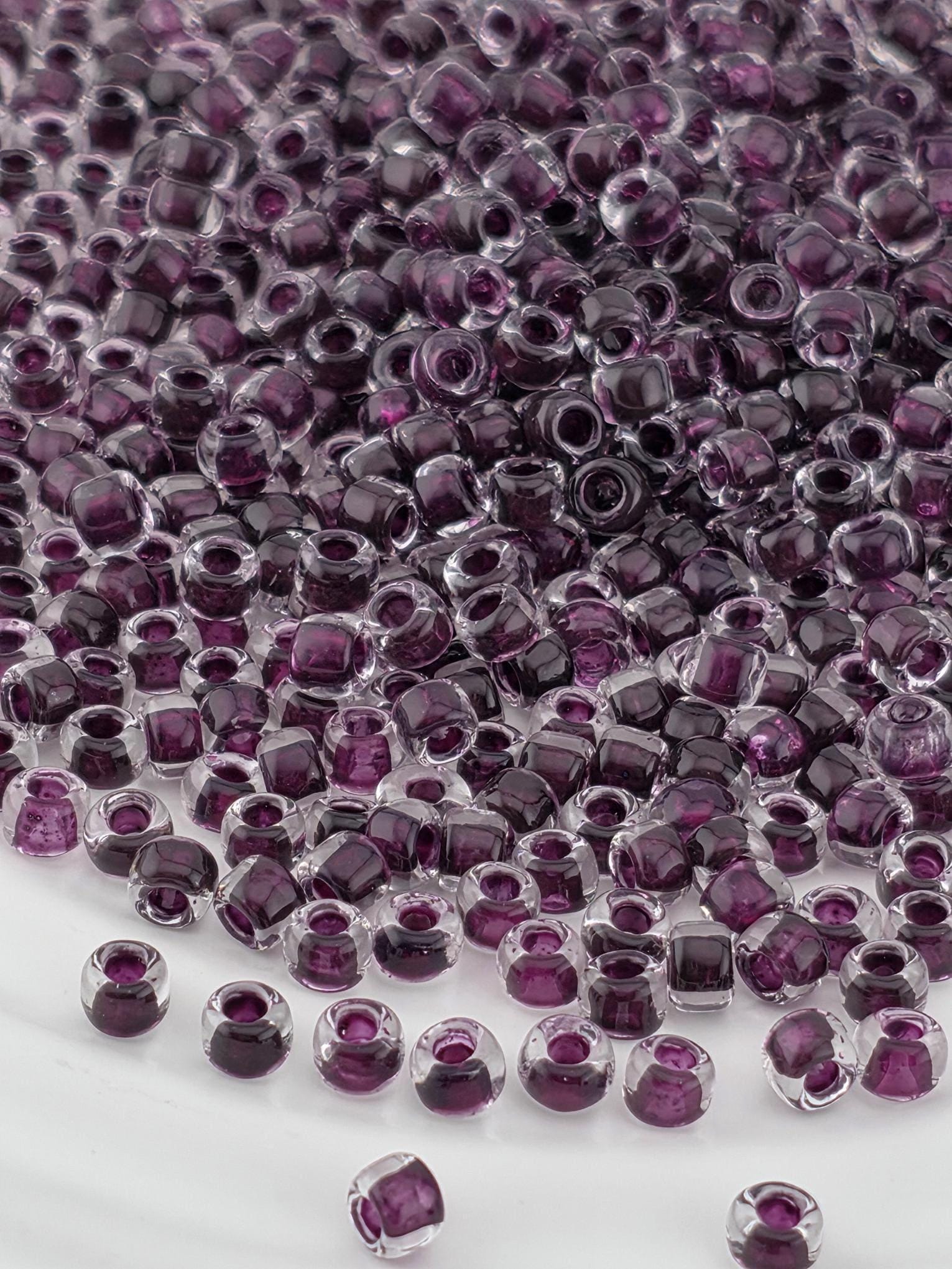 Matsuno Seed Beads: Translucent Dark Mauve - Size 6, 15g Package