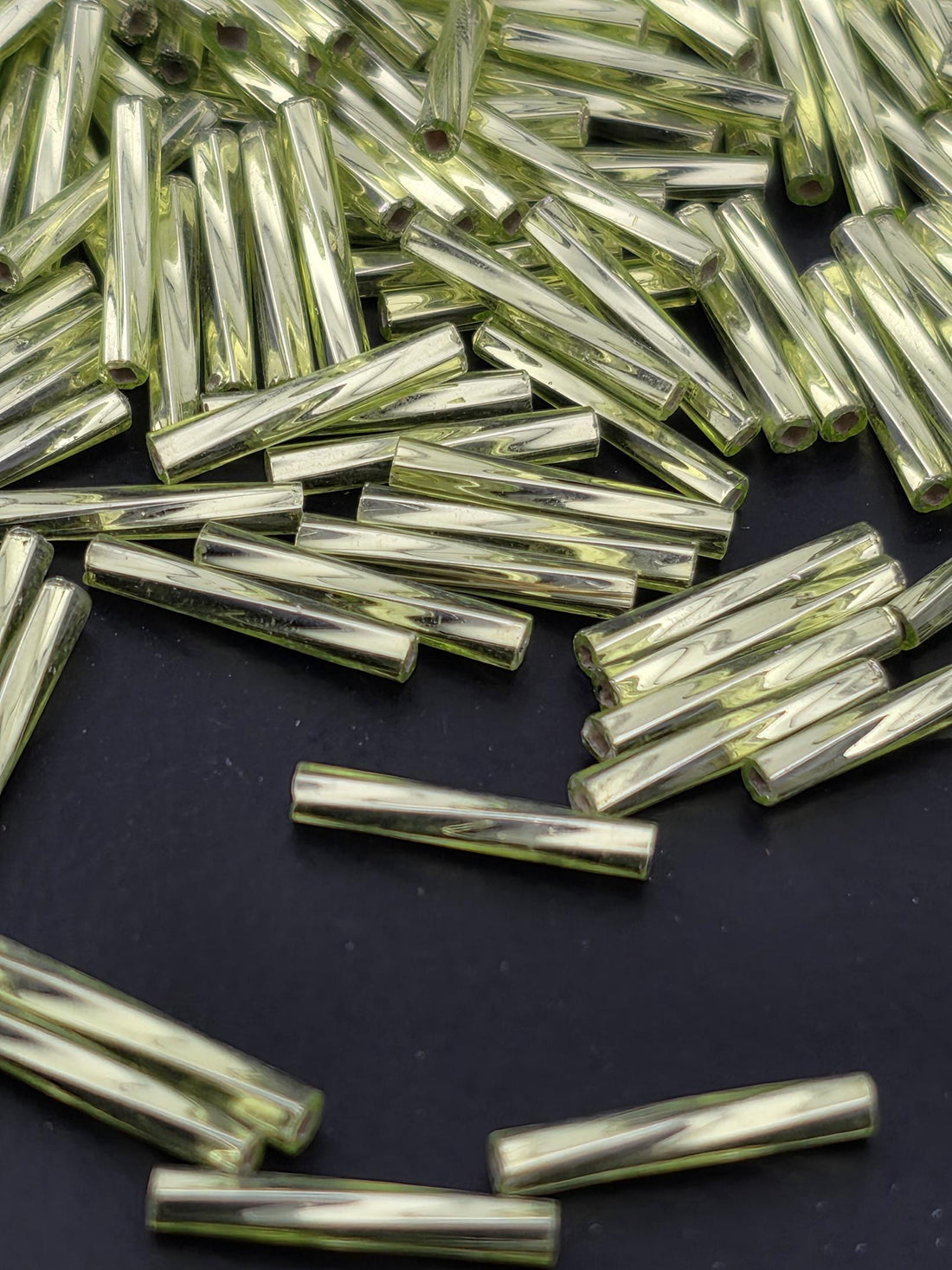 Miyuki Twisted Bugles 2x12 Lime Green Translucent Silver-Lined Size 2x12mm