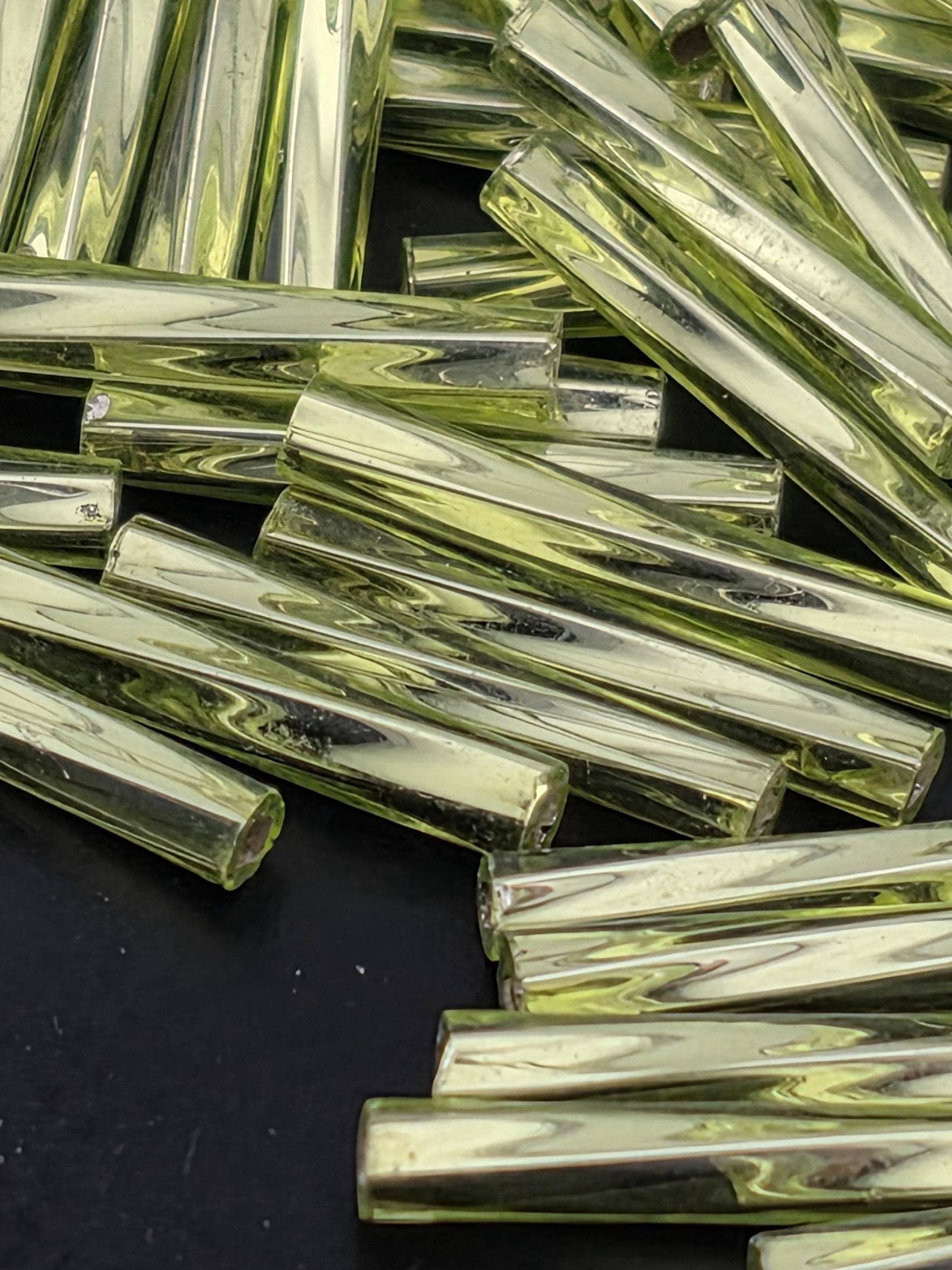 Miyuki Twisted Bugles 2x12 Lime Green Translucent Silver-Lined Size 2x12mm