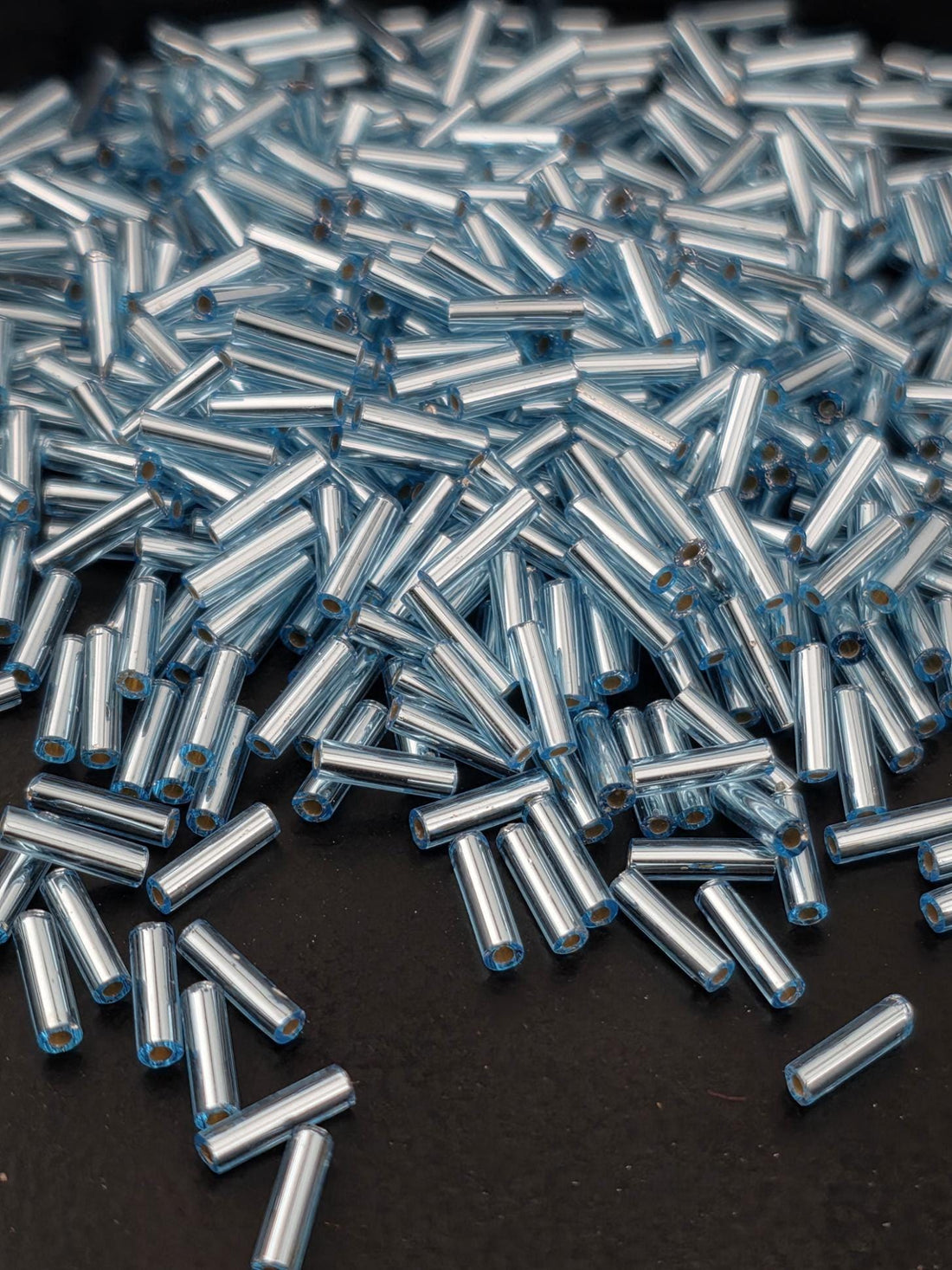 Miyuki Bugles 6MM Blue Topaz Translucent Silver-Lined Size 6mm