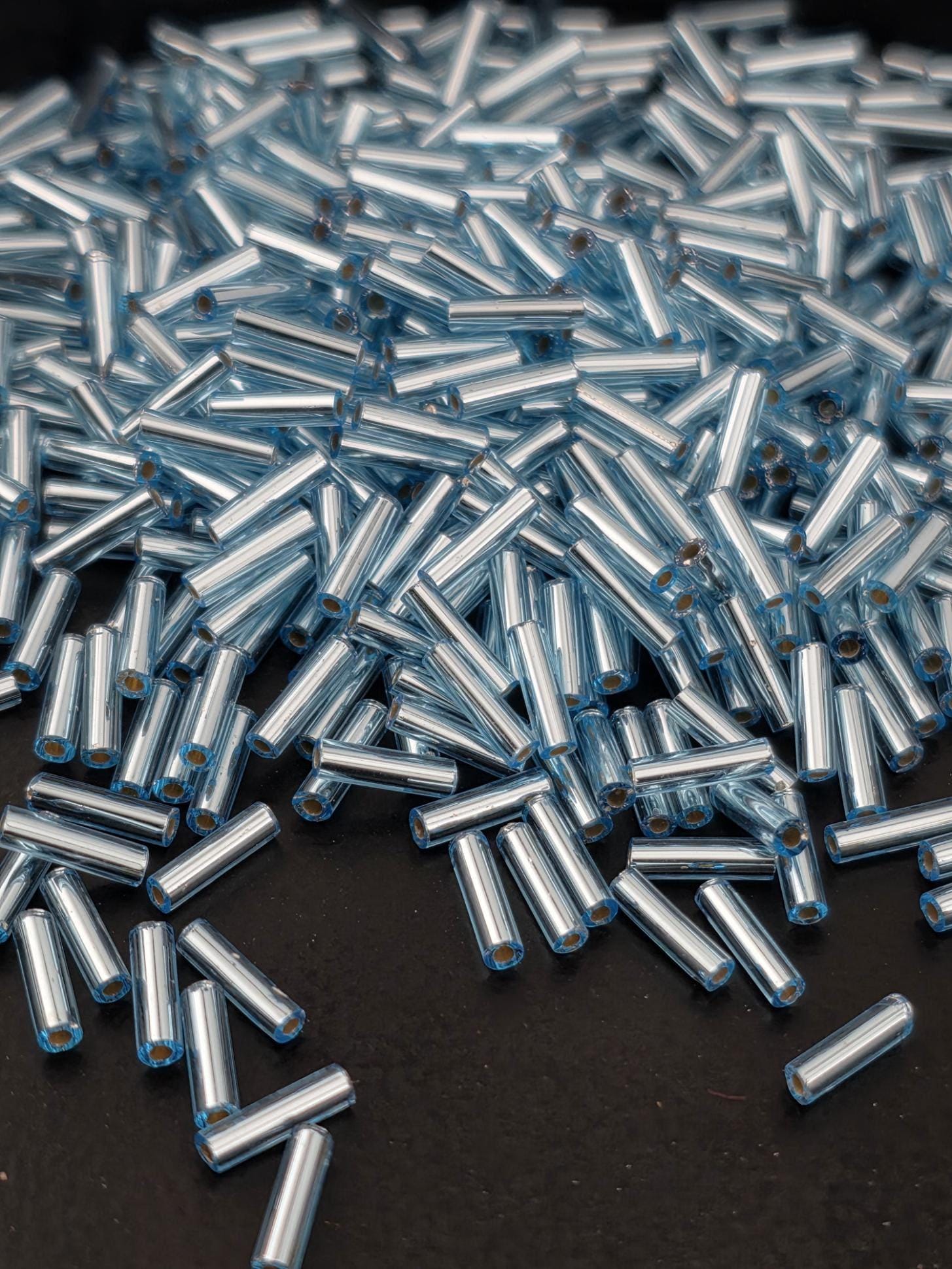 Miyuki Bugles 6MM Blue Topaz Translucent Silver-Lined Size 6mm