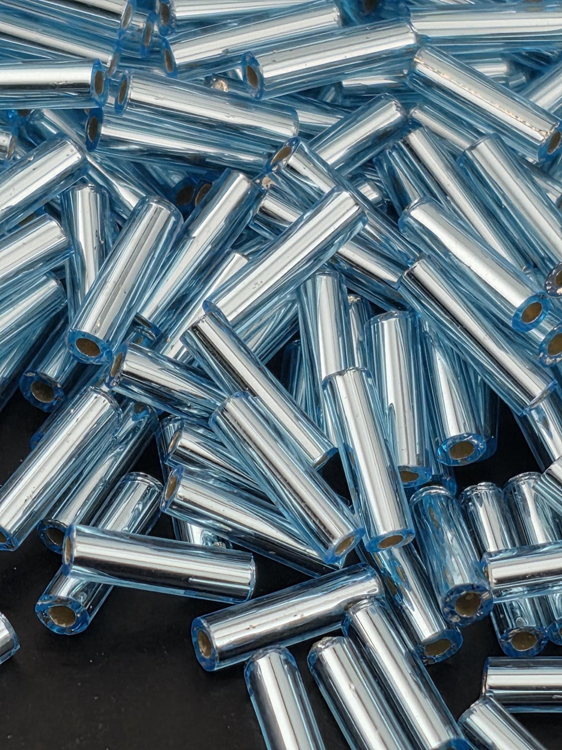 Miyuki Bugles 6MM Blue Topaz Translucent Silver-Lined Size 6mm