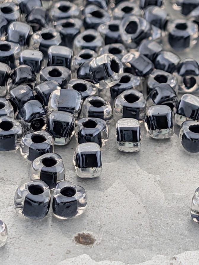 Crystal/Black Inside Color Lined Miyuki Triangle Size 8/0 (15g Pkg)