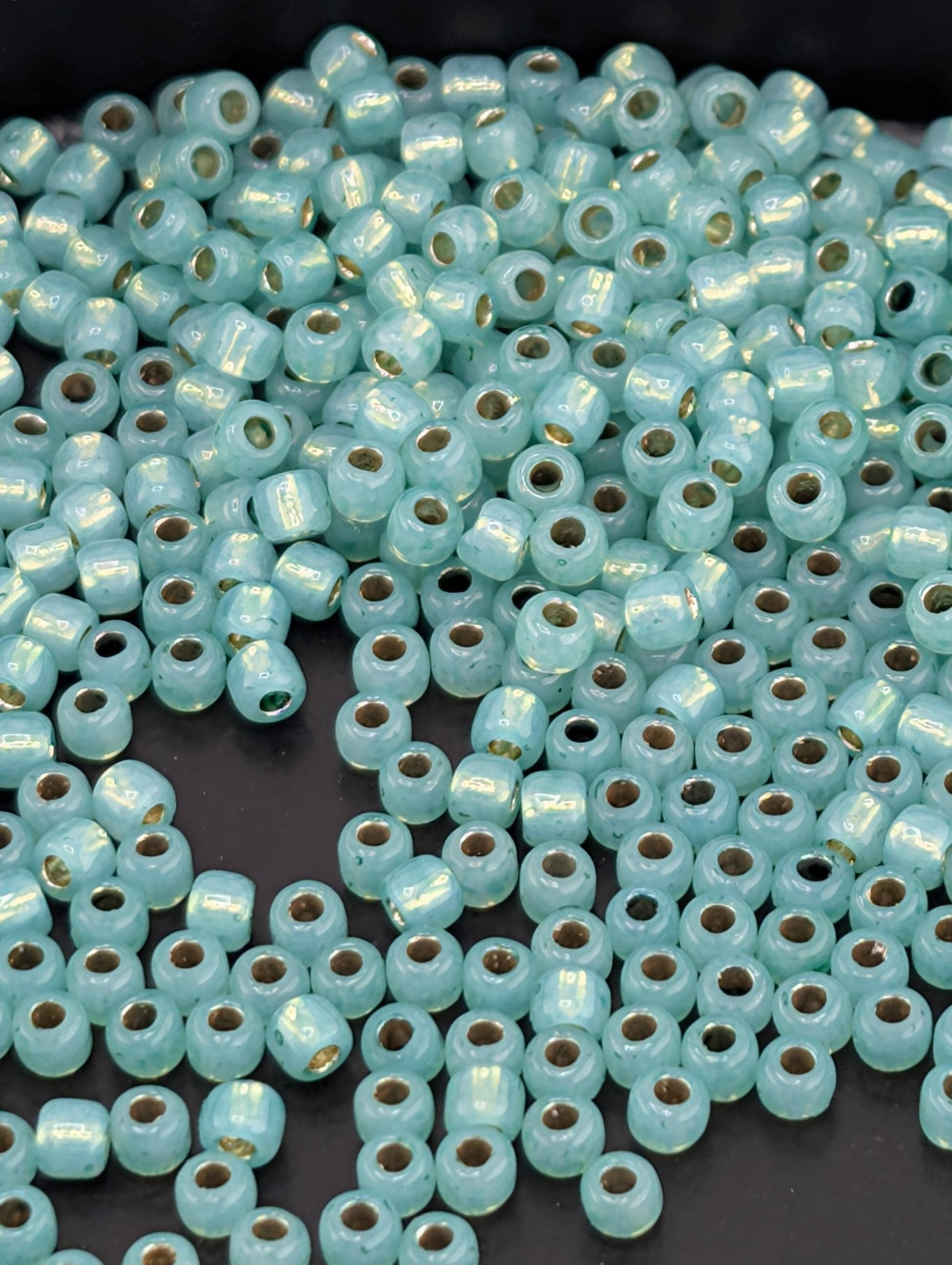 PermaFinish - Silver-Lined Milky Dk Peridot Size 11/0 Toho Round 2.5" tube