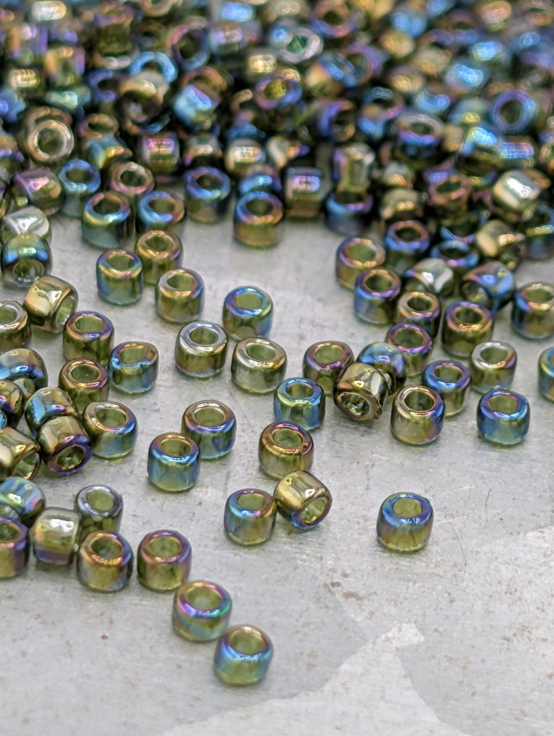 Transparent-Rainbow Olivine Size 15/0 Toho Round 2.5" tube