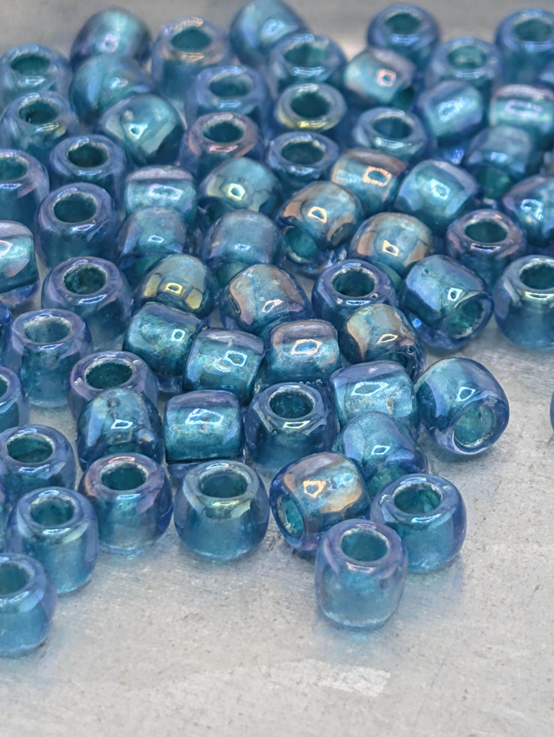 Toho Japanese Seed Beads, Size 6/0 Crystal Green Rainbow (2.5" Tube, 8-9g)