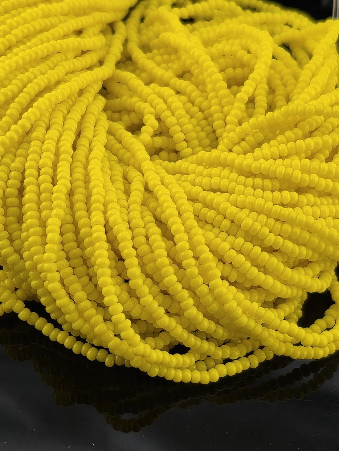 Preciosa 11/0 Czech Yellow Op 6 String/Hnk-Appx 19 Gms