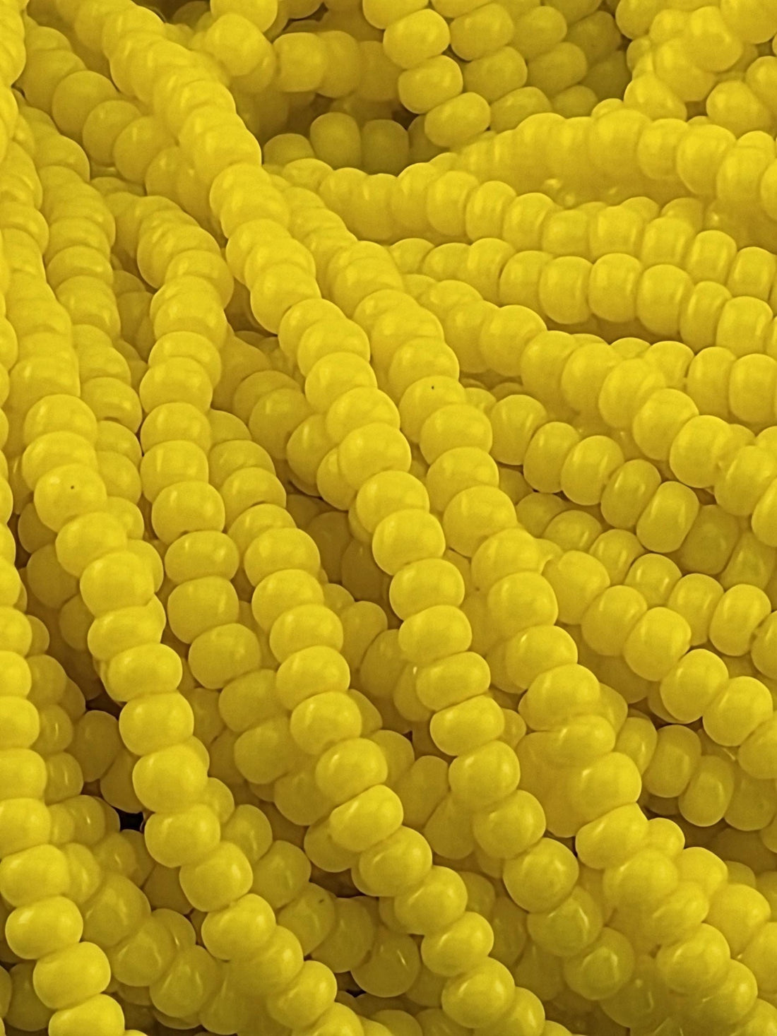 Preciosa 11/0 Czech Yellow Op 6 String/Hnk-Appx 19 Gms