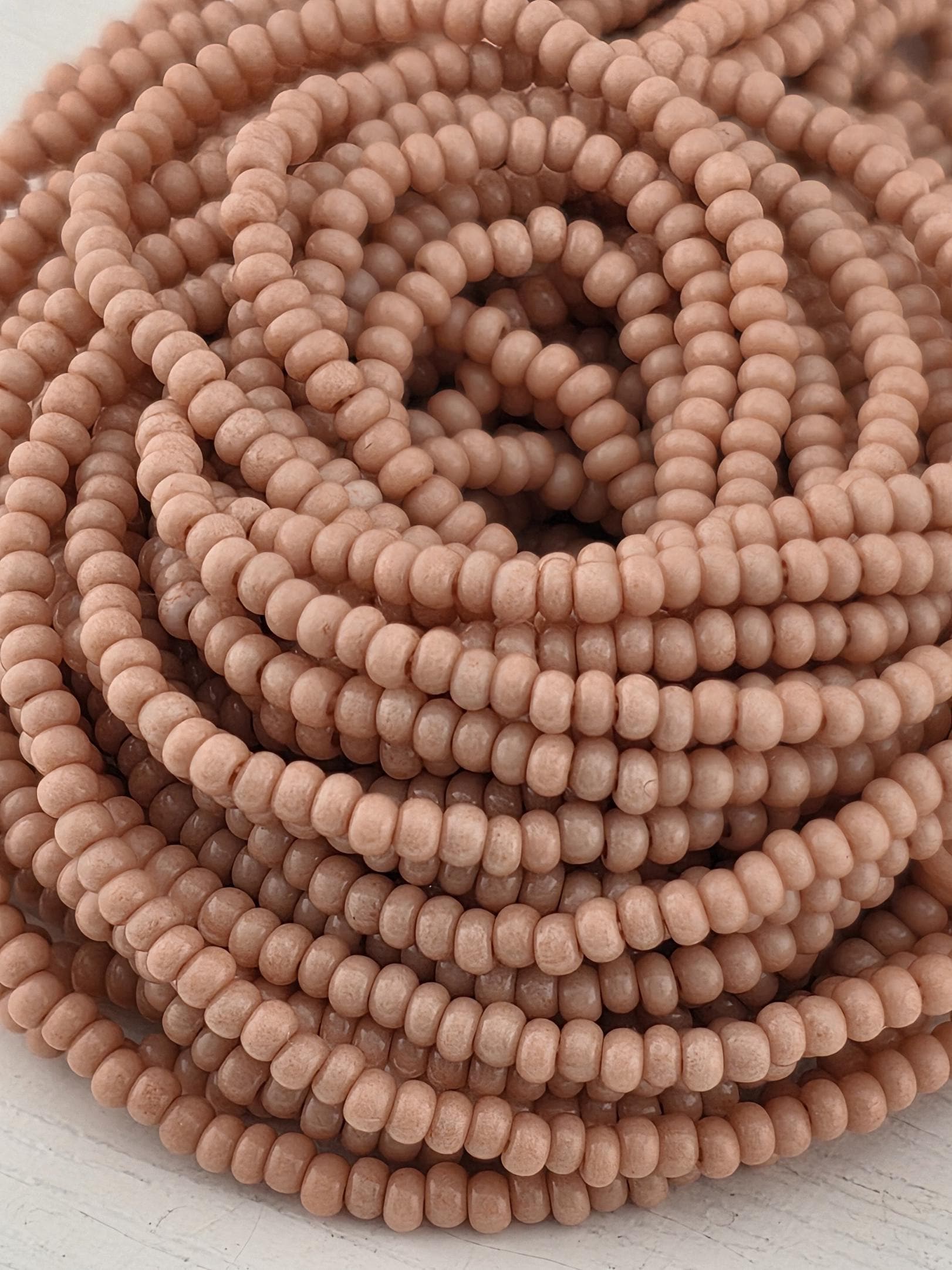 Preciosa 11/0 Czech Pink Op -6 String/Hnk-Appx 18 Gms