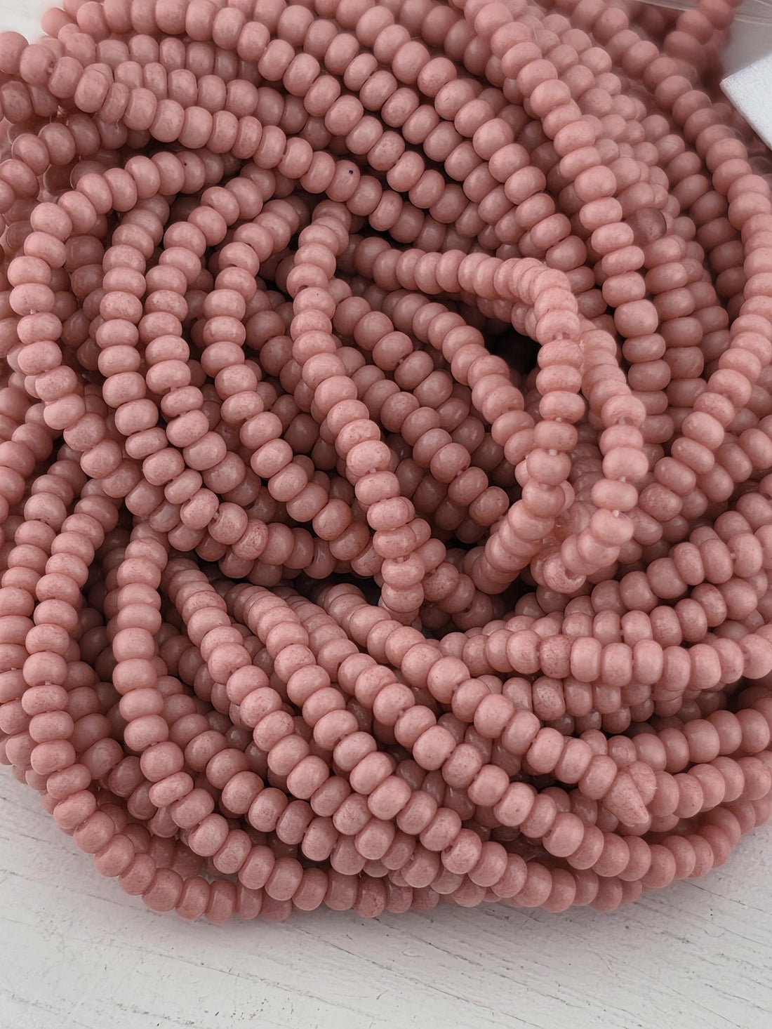 Preciosa 11/0 Czech Pink Coral Opq Solgel-6 String/Hnk-Appx 18 Gms