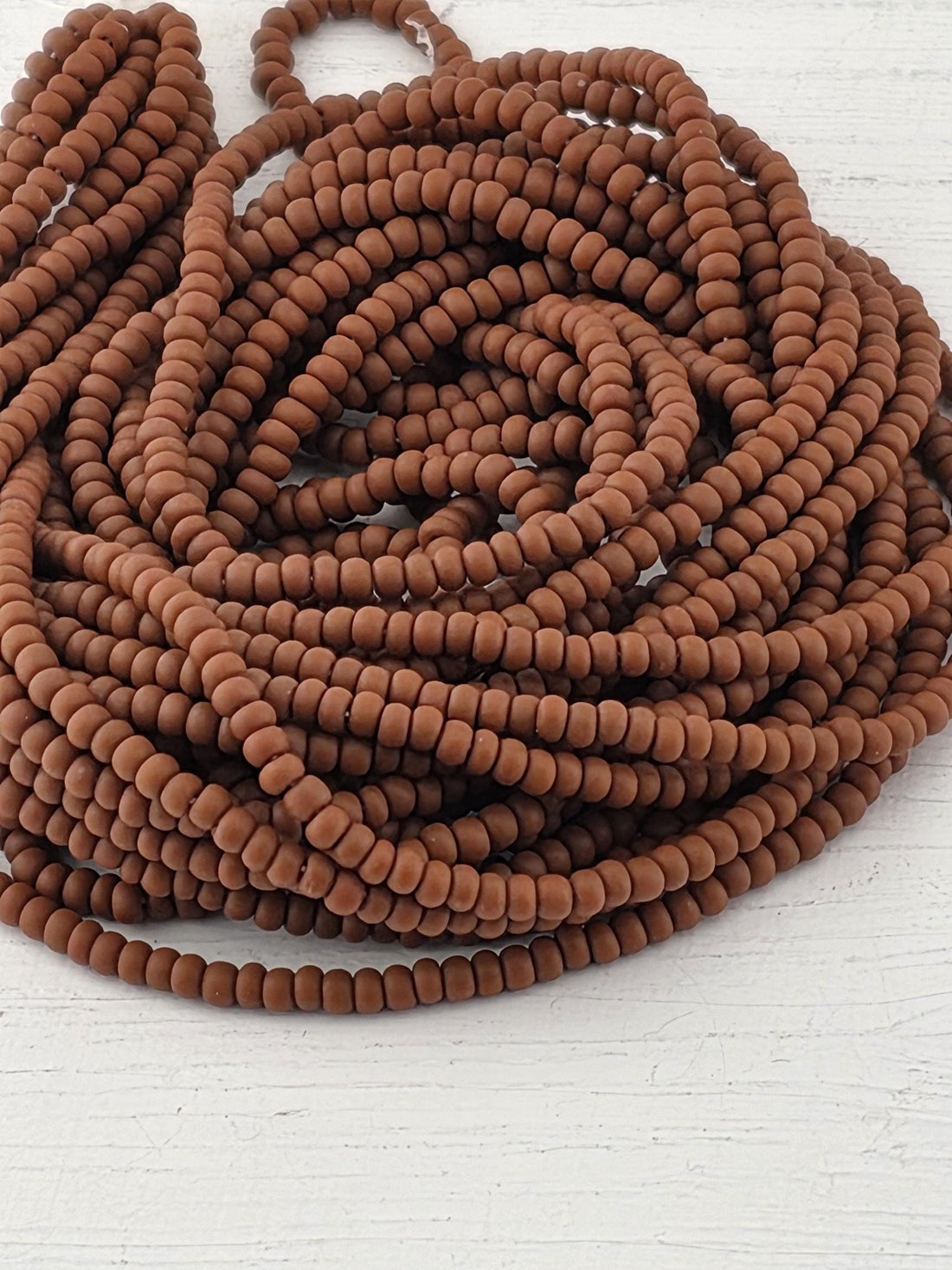 Preciosa 11/0 Czech Brown Matte -6 String/Hnk-Appx 18 Gms