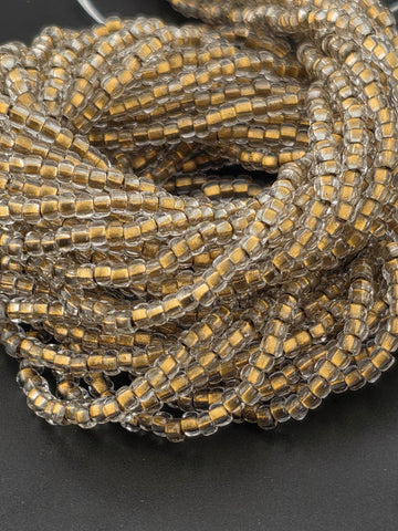 Preciosa 11/0 Czech Crystal Bronze/L -6 String/Hnk-Appx 18 Gms