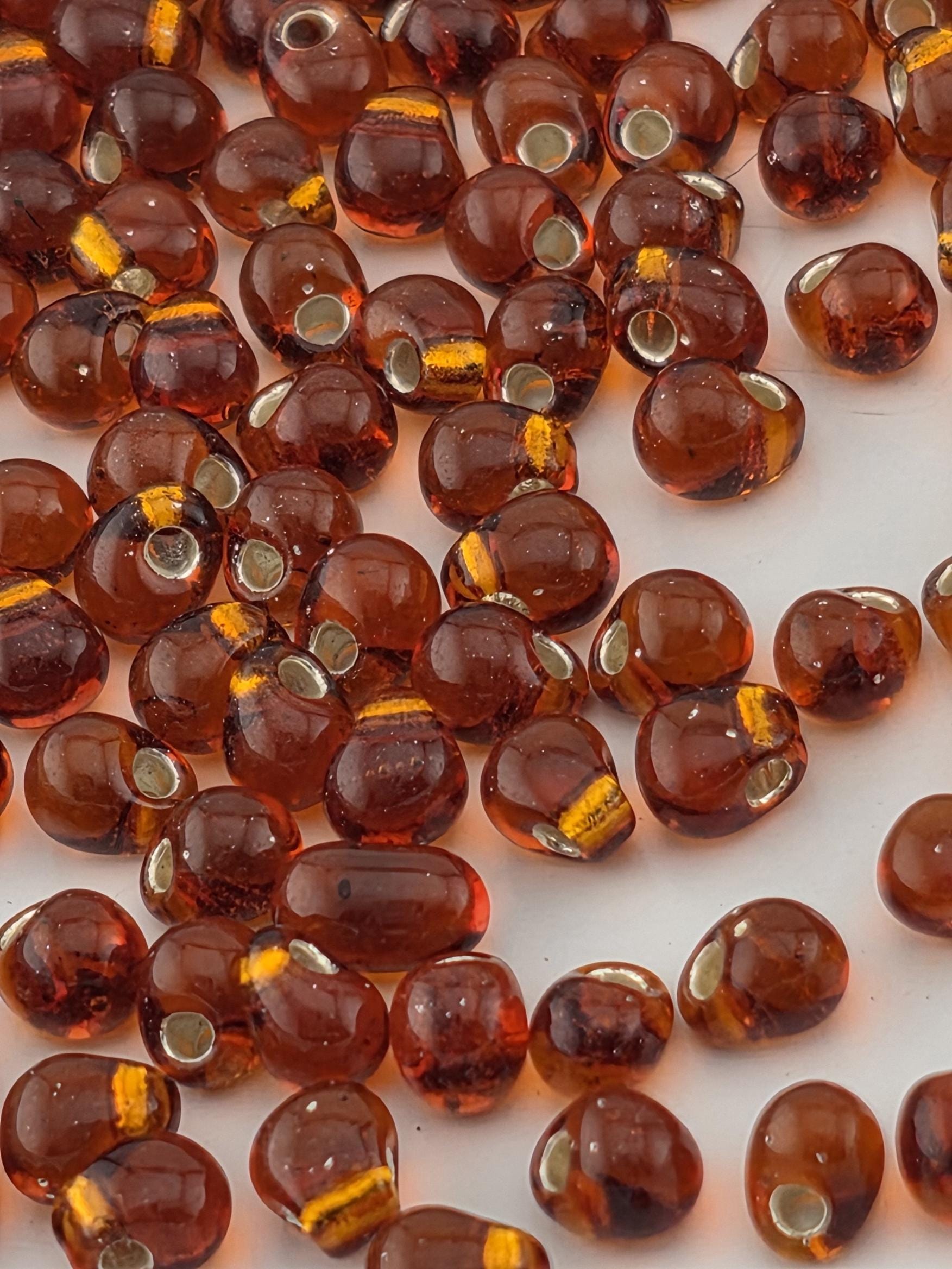 Miyuki Drop Dark Topaz Translucent Silver-Lined Size 3.4mm