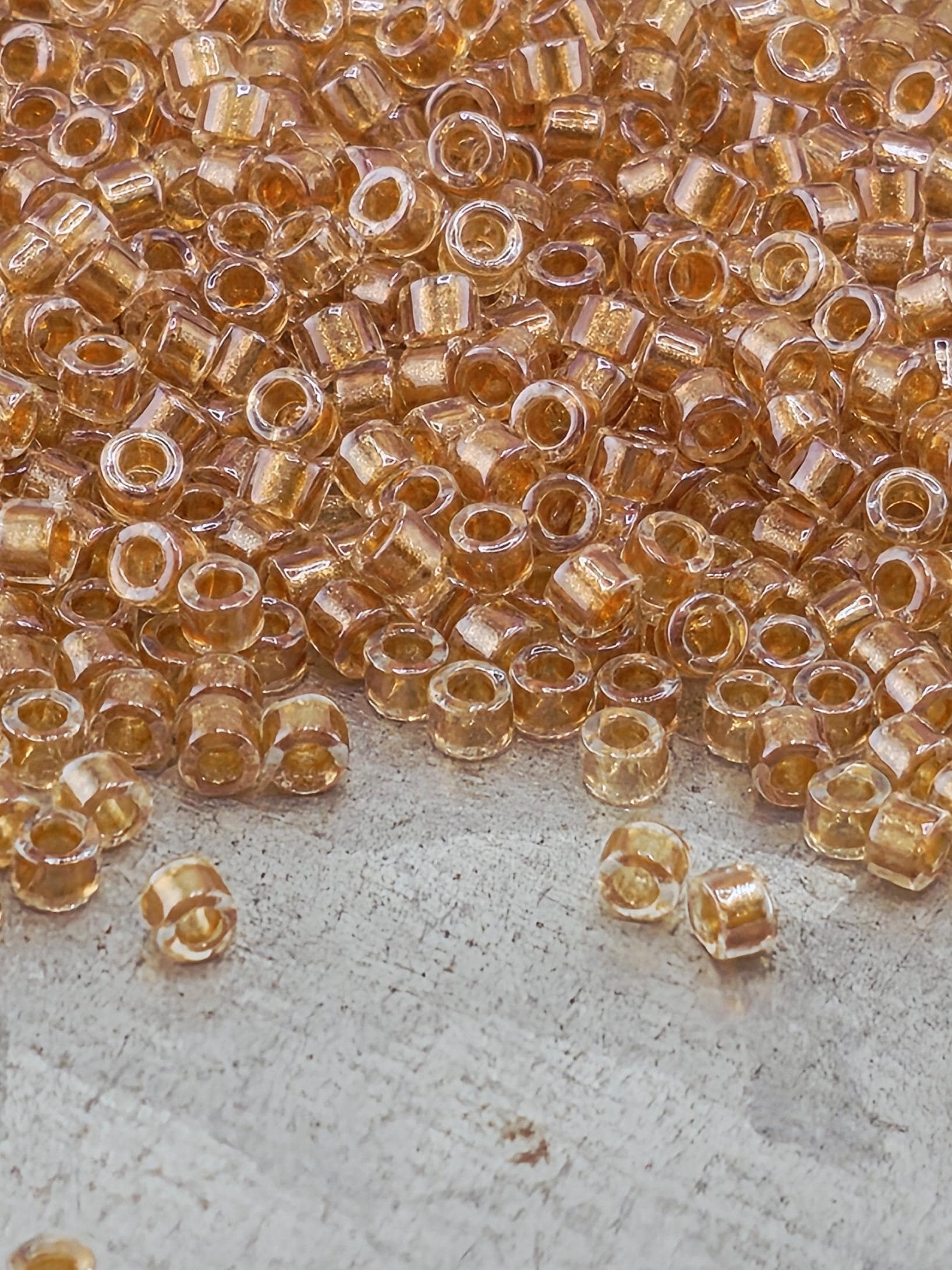 DB0901:Crystal/Rose Gold Inside Color Lined Sparkle Duracoat Miyuki Delica (Size 11, 7 grams, ~1400 beads)