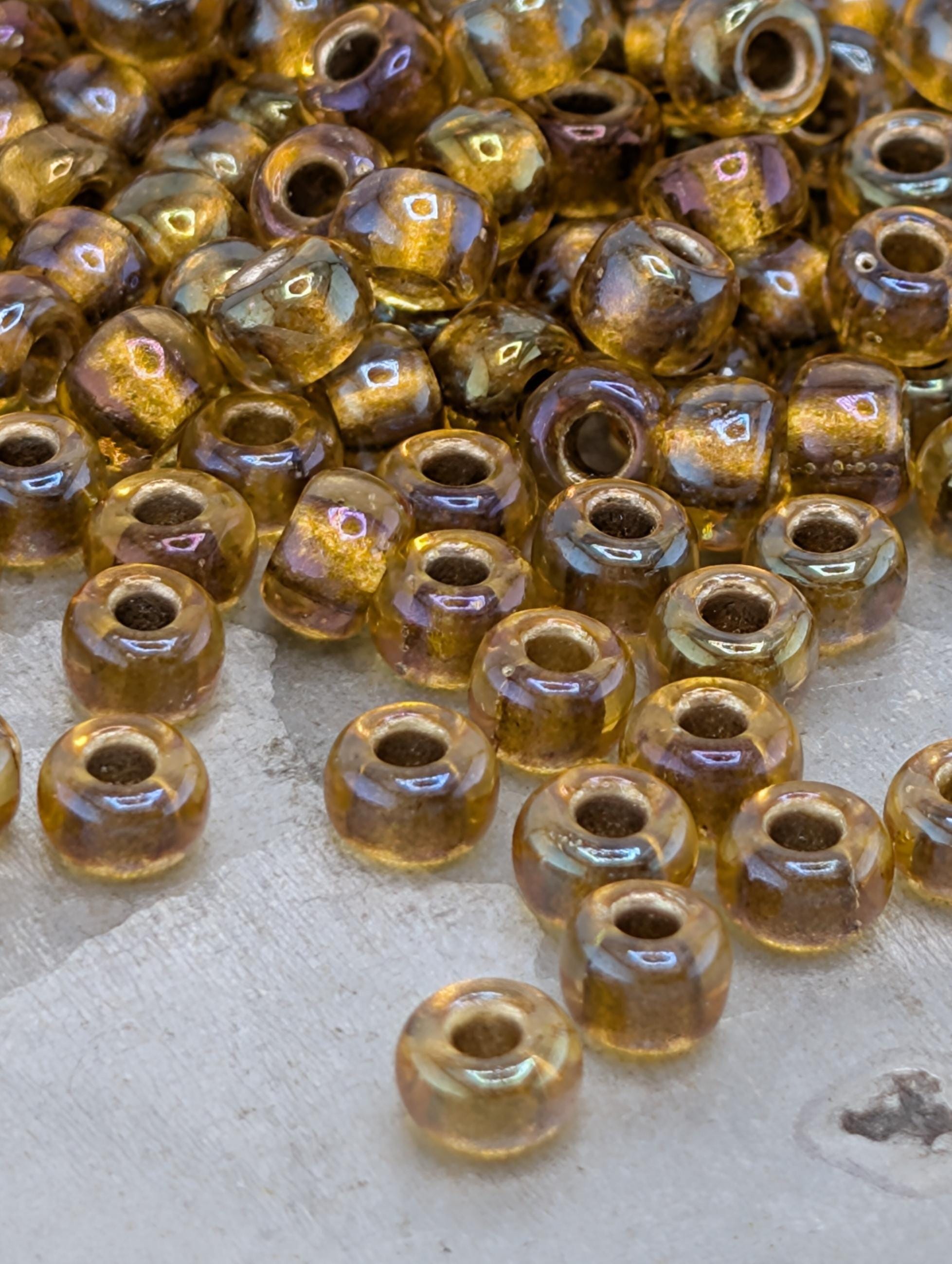 6-1126:Amber/Amber ICL*-Miyuki Rocaille 6/0 (20g pkg ~240 pcs)