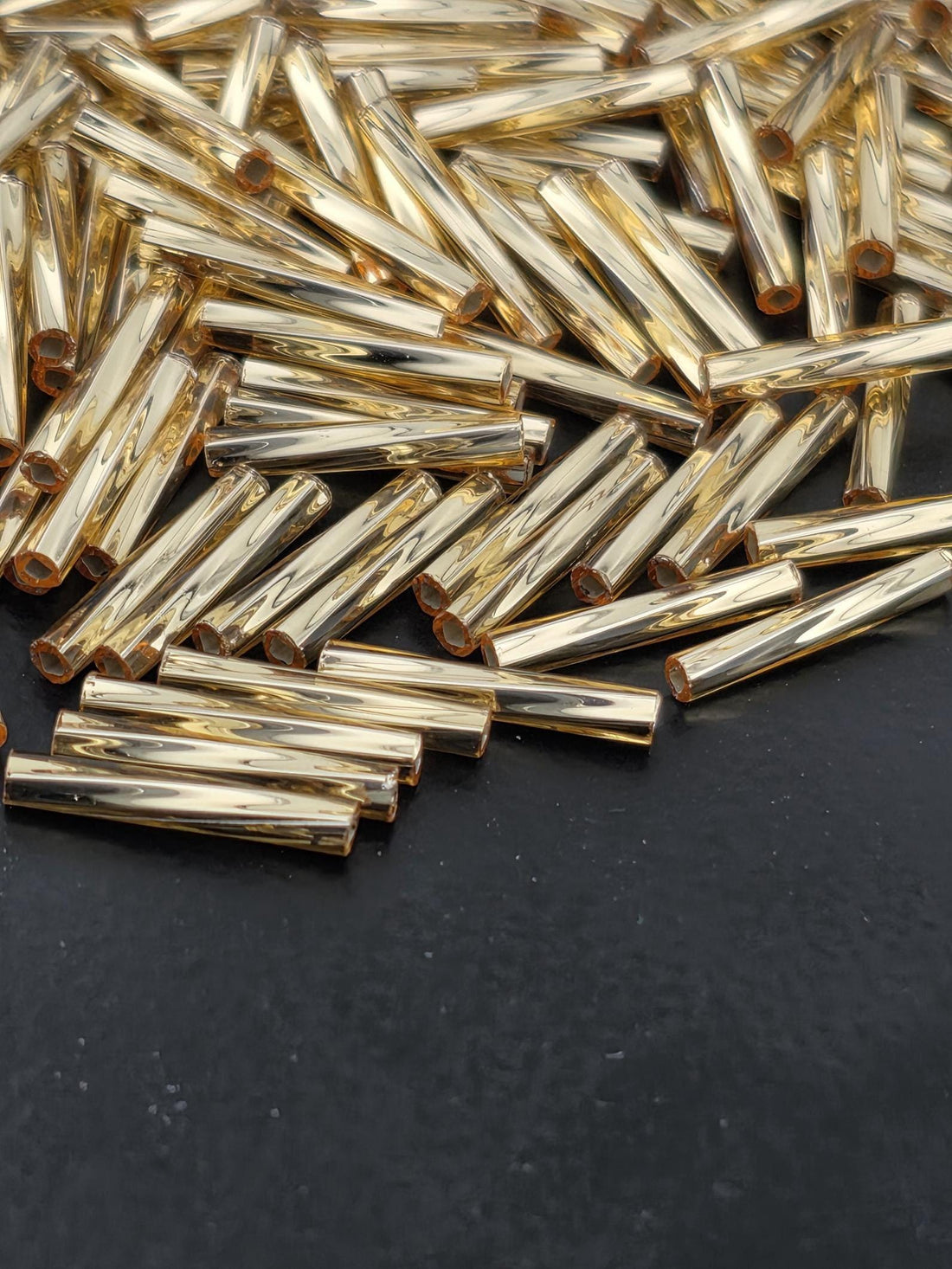 Miyuki Twisted Bugles 2x12 Gold Translucent Silver-Lined Size 2x12mm