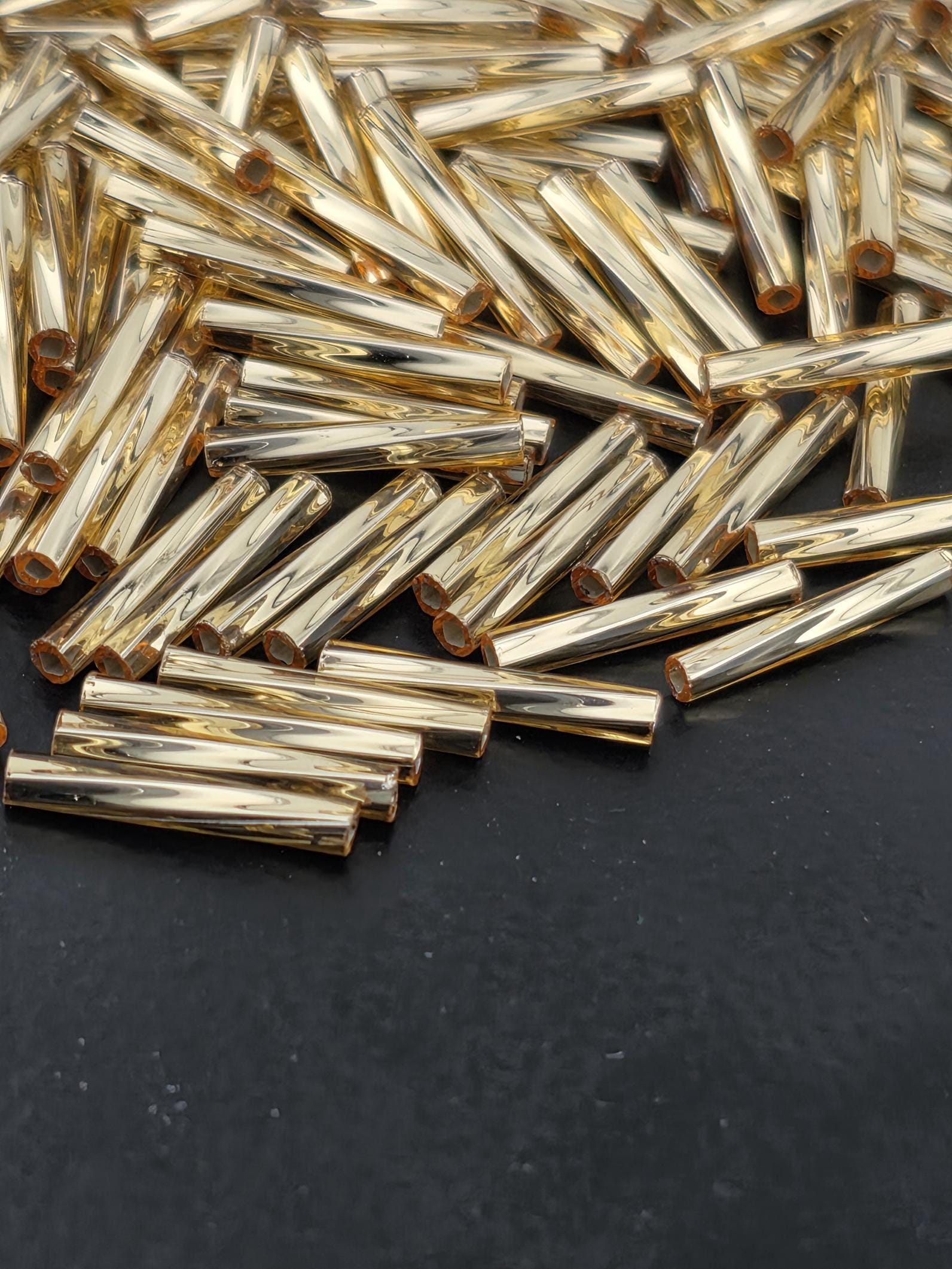 Miyuki Twisted Bugles 2x12 Gold Translucent Silver-Lined Size 2x12mm