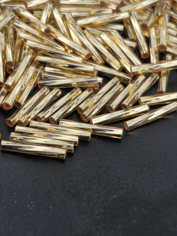 Miyuki Twisted Bugles 2x12 Gold Translucent Silver-Lined Size 2x12mm