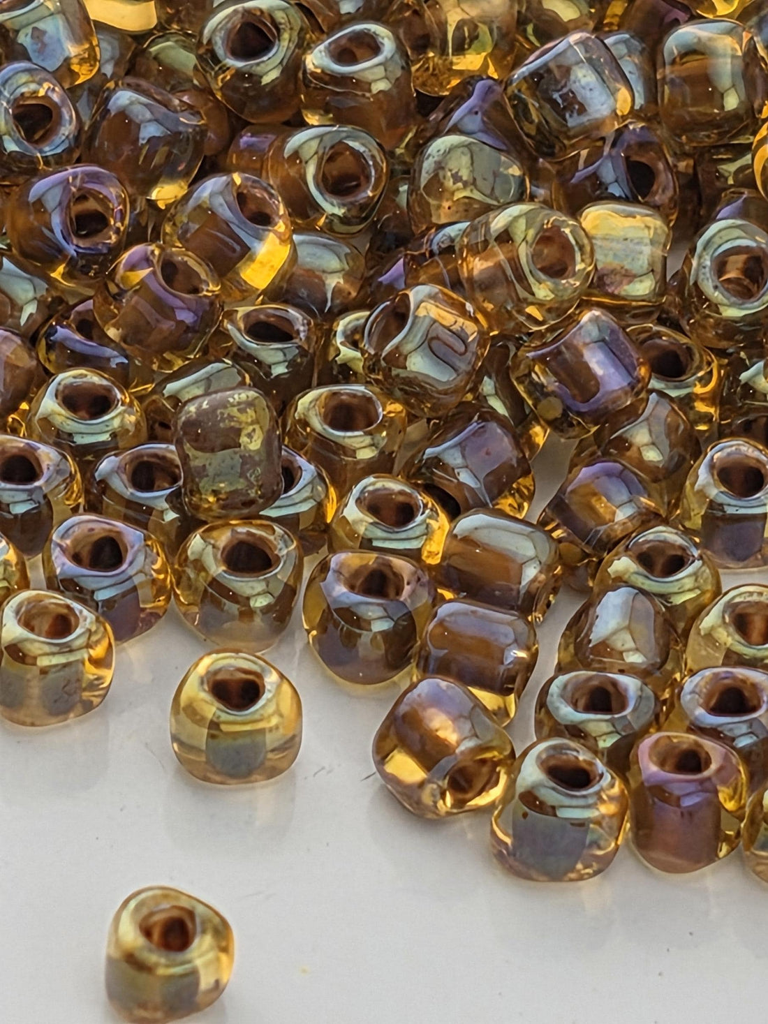 Amber/Brown Inside Color Lined Miyuki Triangle Size 8/0 (15g Pkg)