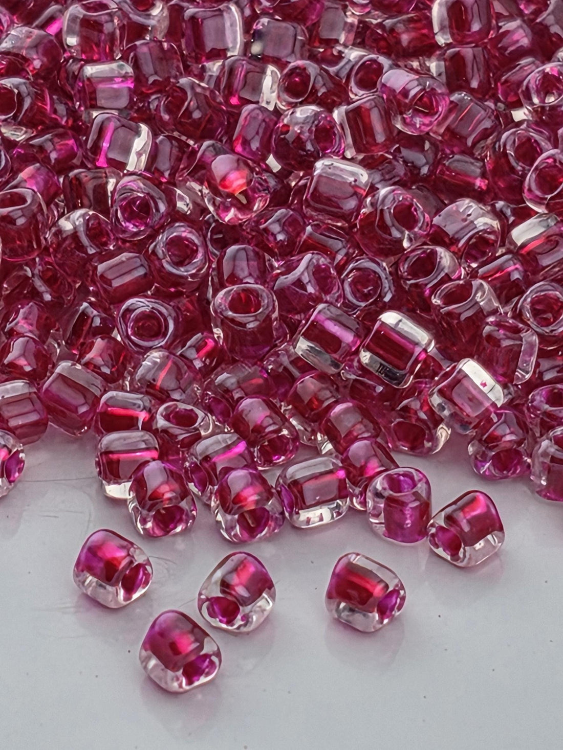 Crystal/Raspberry Inside Color Lined Miyuki Triangle Size 10/0 (15g Pkg)
