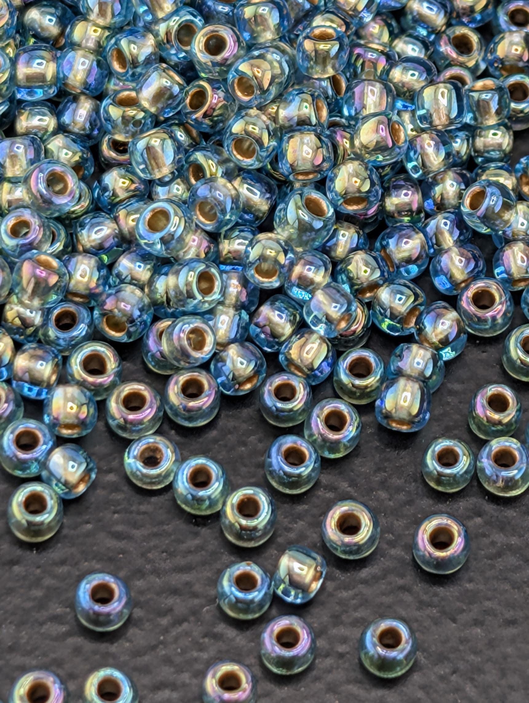 Gold-Lined Rainbow Aqua Size 11/0 Toho Round 2.5" tube