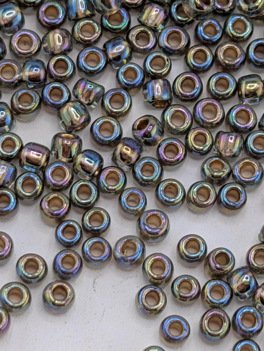 Gold-Lined Rainbow Black Diamond Size 11/0 Toho Round 2.5" tube