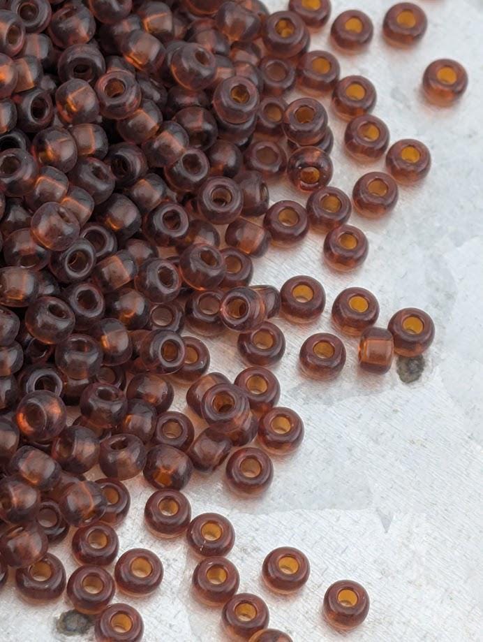 Dark Amber Transparent Miyuki Rocaille Size 8/0 (20g pkg)