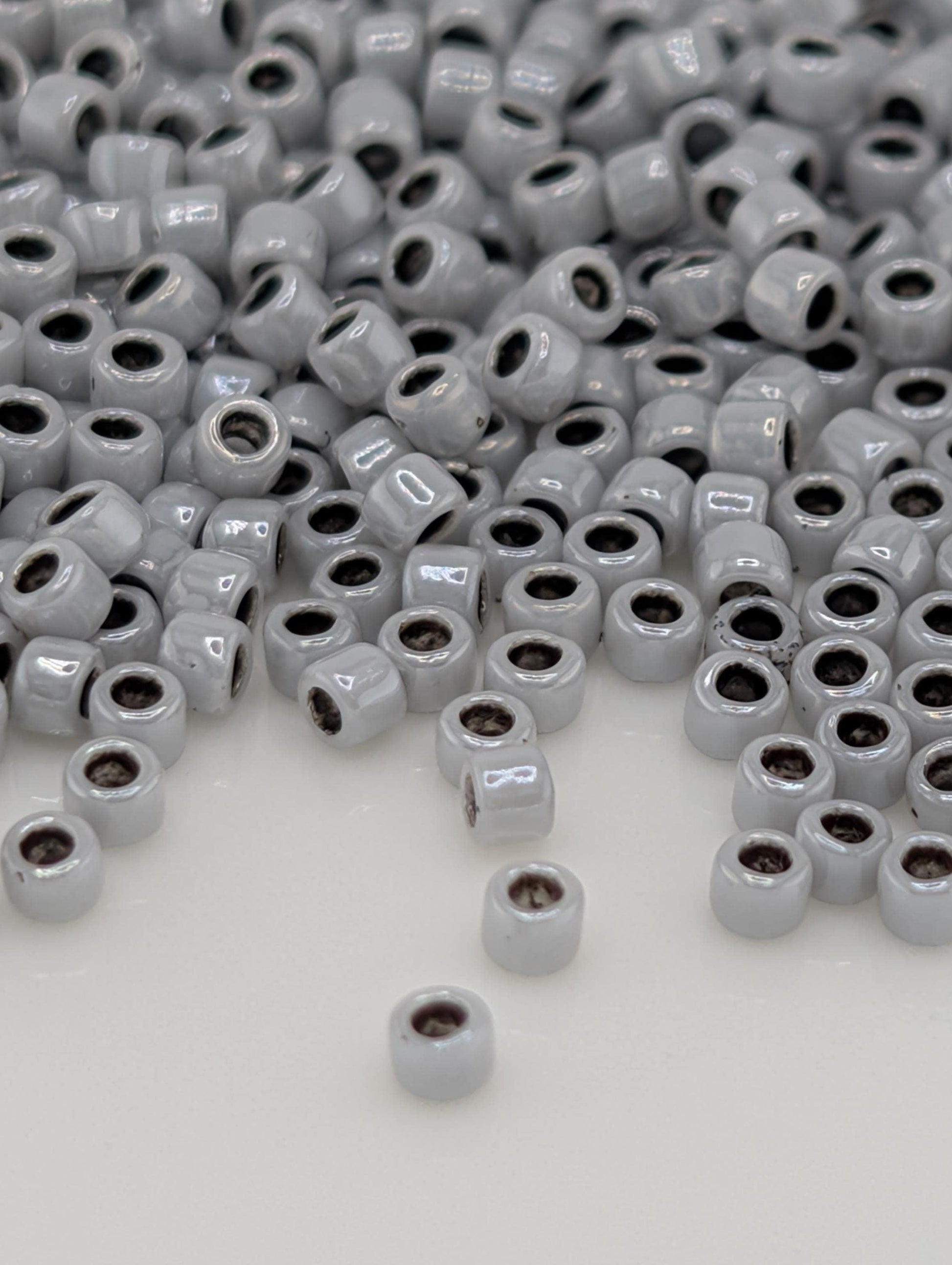 Inside-Color Opaque Gray/Black-Lined Size 15/0 Toho Round 2.5" tube