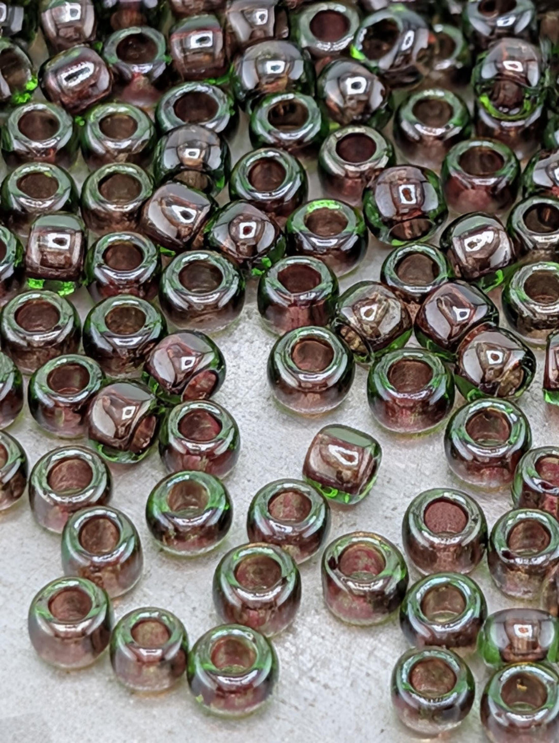 Toho Japanese Seed Beads Peridot with Fuchsia Lining - Size 8/0, 2.5" Tube ~8-9g