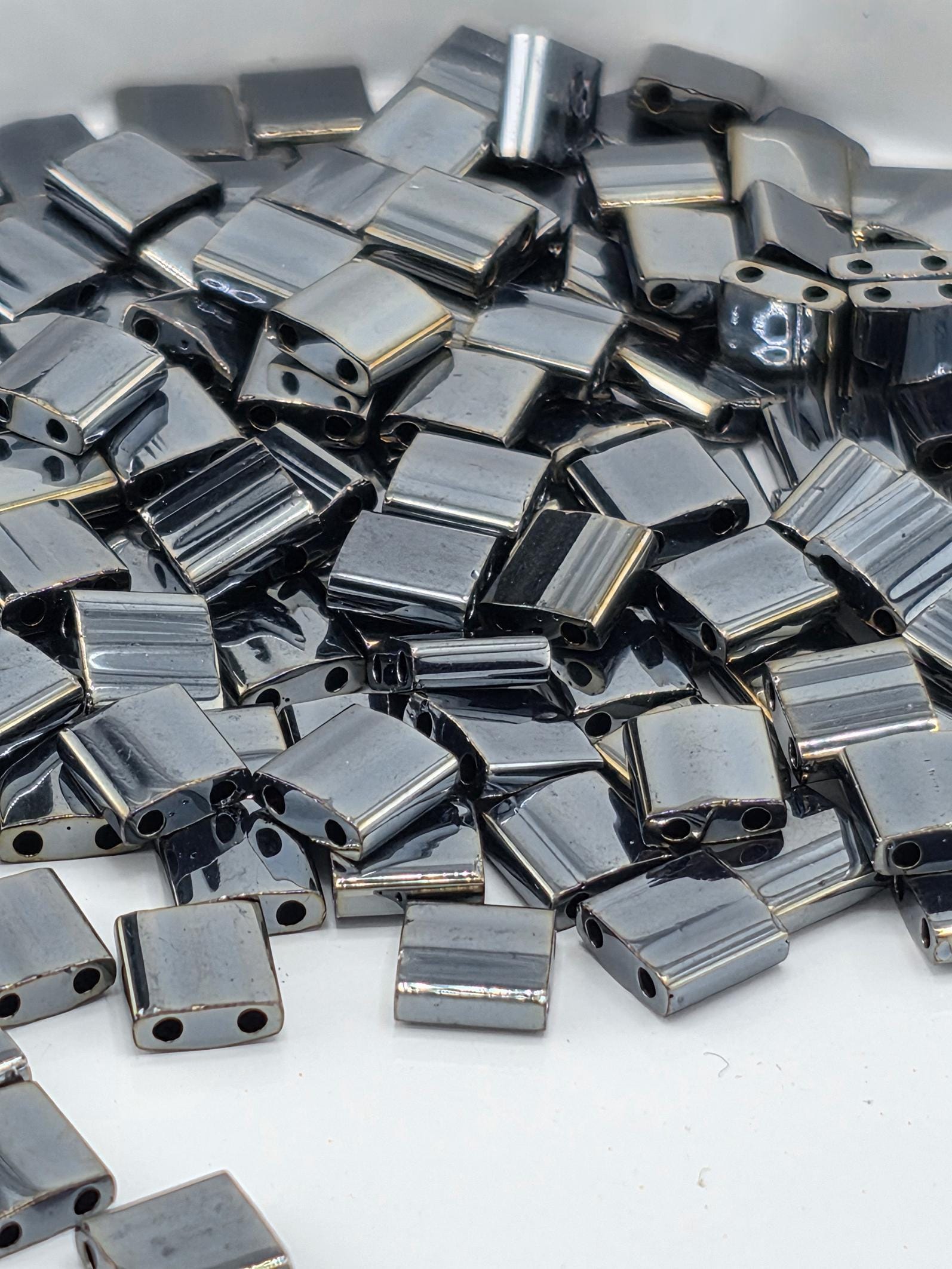 TL0464-Miyuki Tila Beads:Gunmetal M (7.5g pkg)